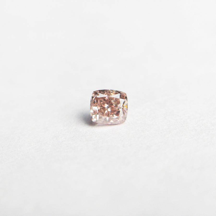 The 0.13ct 2.86x2.63x1.93mm GIA Fancy Orangy Pink Cushion Brilliant 🇦🇺 24101-01 by East London jeweller Rachel Boston | Discover our collections of unique and timeless engagement rings, wedding rings, and modern fine jewellery. - Rachel Boston Jewellery