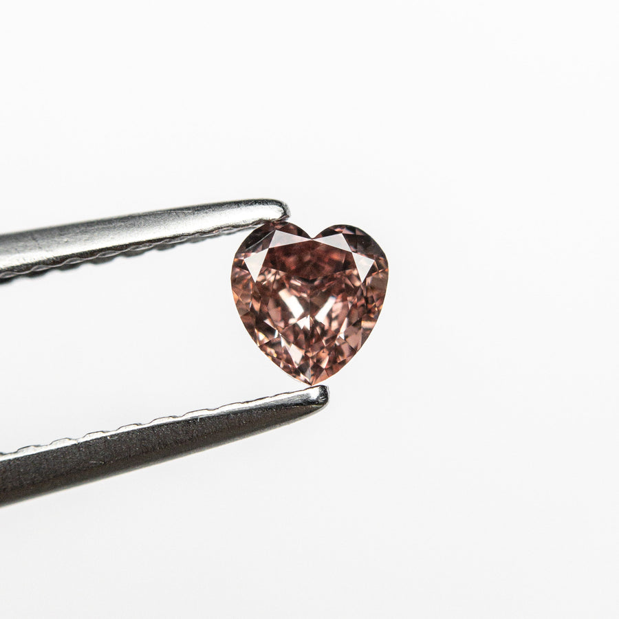 The 0.23ct 4.15x3.96x2.04mm GIA VS1 Fancy Deep Orangy Pink Heart Brilliant 🇦🇺 24121-01 by East London jeweller Rachel Boston | Discover our collections of unique and timeless engagement rings, wedding rings, and modern fine jewellery. - Rachel Boston Jewellery