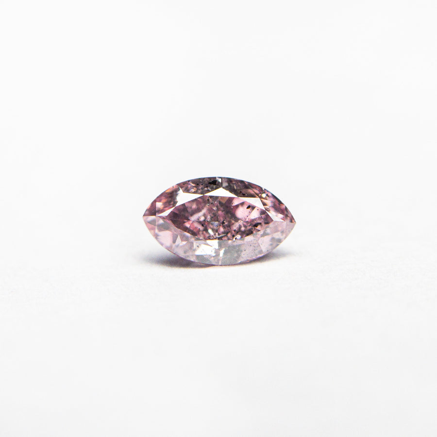 The 0.29ct 5.70x3.27x2.29mm GIA I1 Fancy Intense Purplish Pink Marquise Brilliant 24148-01 by East London jeweller Rachel Boston | Discover our collections of unique and timeless engagement rings, wedding rings, and modern fine jewellery. - Rachel Boston Jewellery
