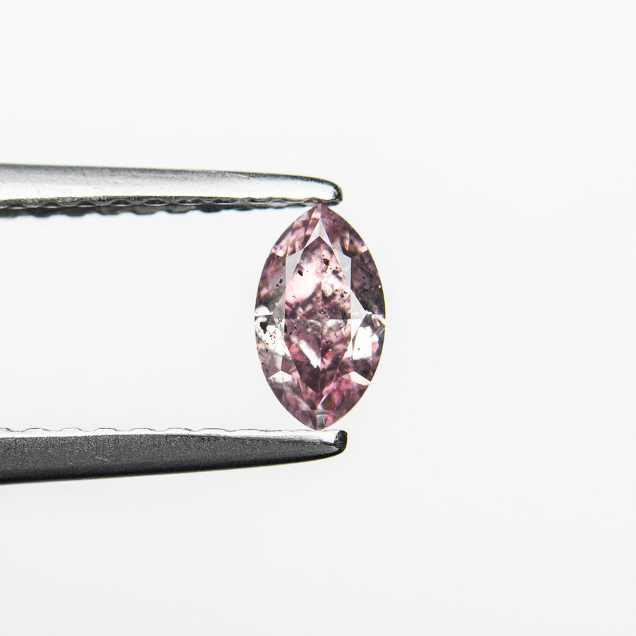 The 0.29ct 5.70x3.27x2.29mm GIA I1 Fancy Intense Purplish Pink Marquise Brilliant 24148-01 by East London jeweller Rachel Boston | Discover our collections of unique and timeless engagement rings, wedding rings, and modern fine jewellery. - Rachel Boston Jewellery