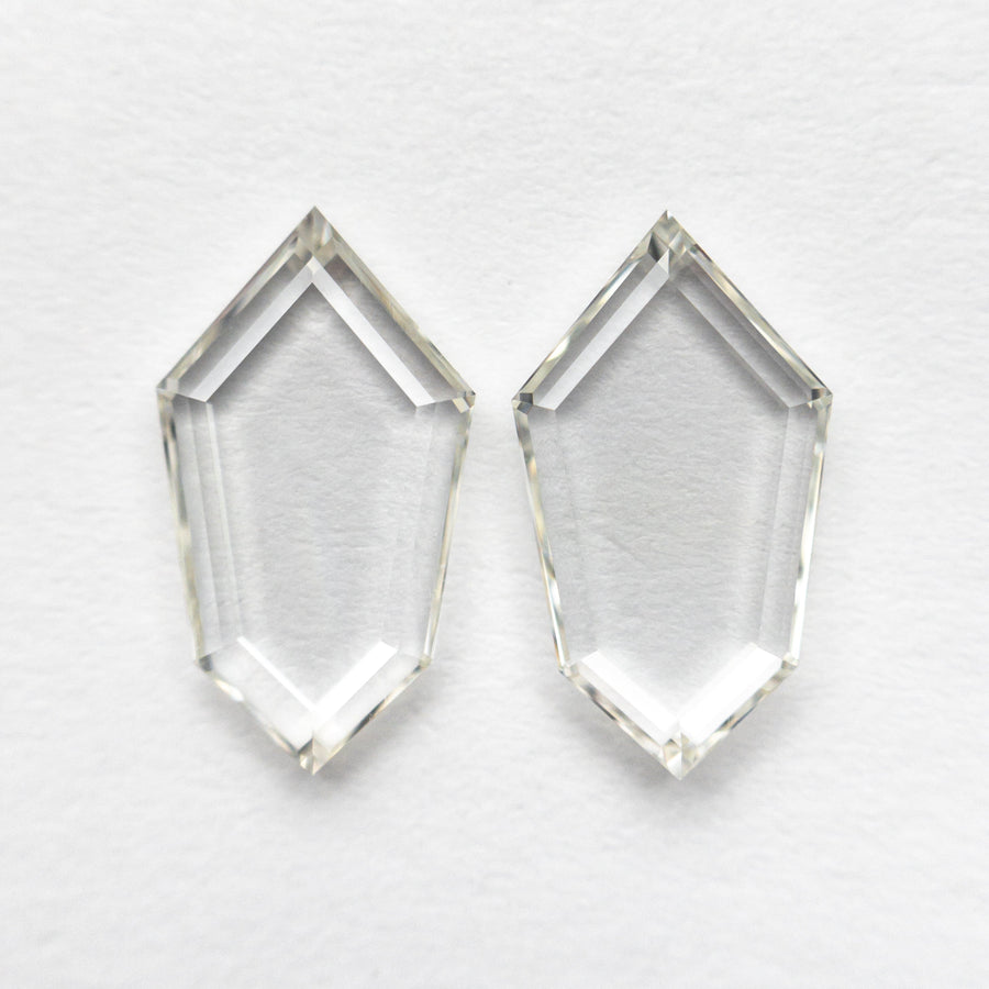 The 1.85cttw 2pc 10.34x5.80x1.54mm 10.30x5.78x1.58mm VS J-K Shield Portrait Cut Matching Pair 19854-49 by East London jeweller Rachel Boston | Discover our collections of unique and timeless engagement rings, wedding rings, and modern fine jewellery. - Rachel Boston Jewellery