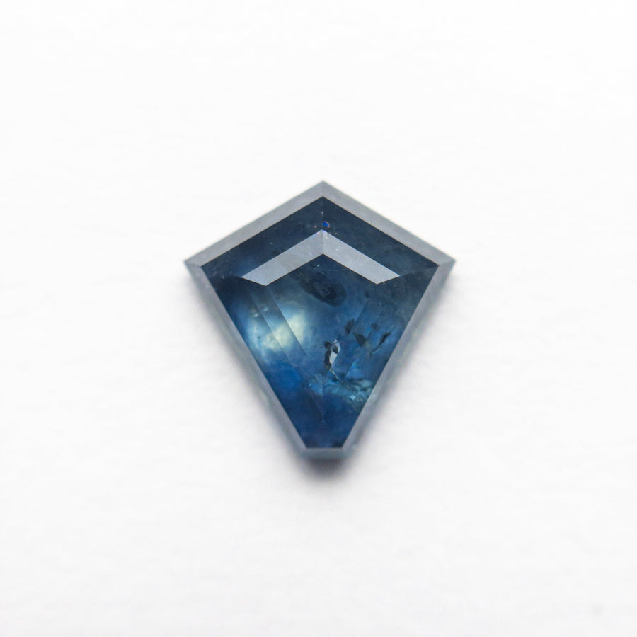 The 1.74ct 8.30x8.21x3.19mm Shield Step Cut Sapphire 22266-25 by East London jeweller Rachel Boston | Discover our collections of unique and timeless engagement rings, wedding rings, and modern fine jewellery. - Rachel Boston Jewellery
