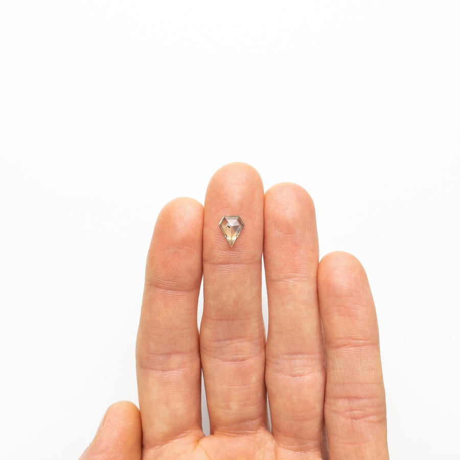 The 1.36ct 9.08x7.23x 2.51mm Shield Rosecut Sapphire 22434-08 by East London jeweller Rachel Boston | Discover our collections of unique and timeless engagement rings, wedding rings, and modern fine jewellery. - Rachel Boston Jewellery