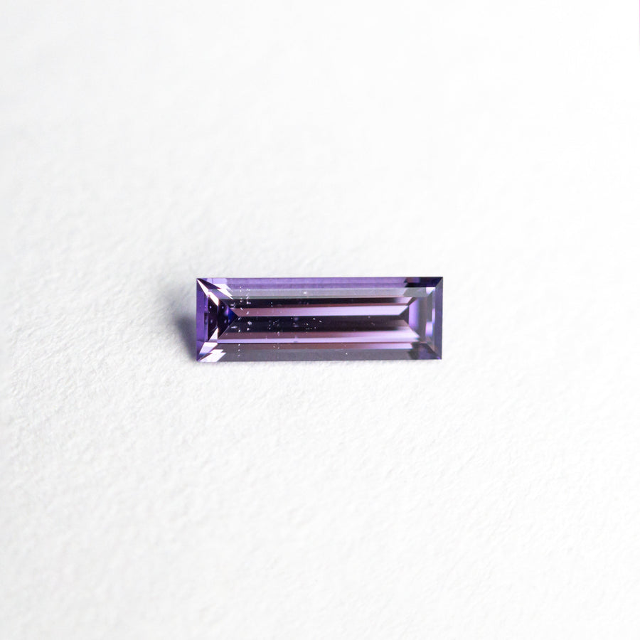 The 0.25ct 6.49x2.16x1.55mm Baguette Step Cut Sapphire 23774-01 by East London jeweller Rachel Boston | Discover our collections of unique and timeless engagement rings, wedding rings, and modern fine jewellery. - Rachel Boston Jewellery