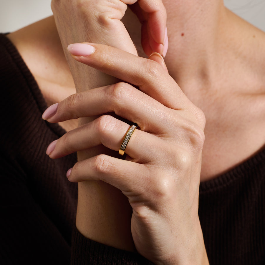 The Princess Cut Channel Set Wedding Band by East London jeweller Rachel Boston | Discover our collections of unique and timeless engagement rings, wedding rings, and modern fine jewellery. - Rachel Boston Jewellery