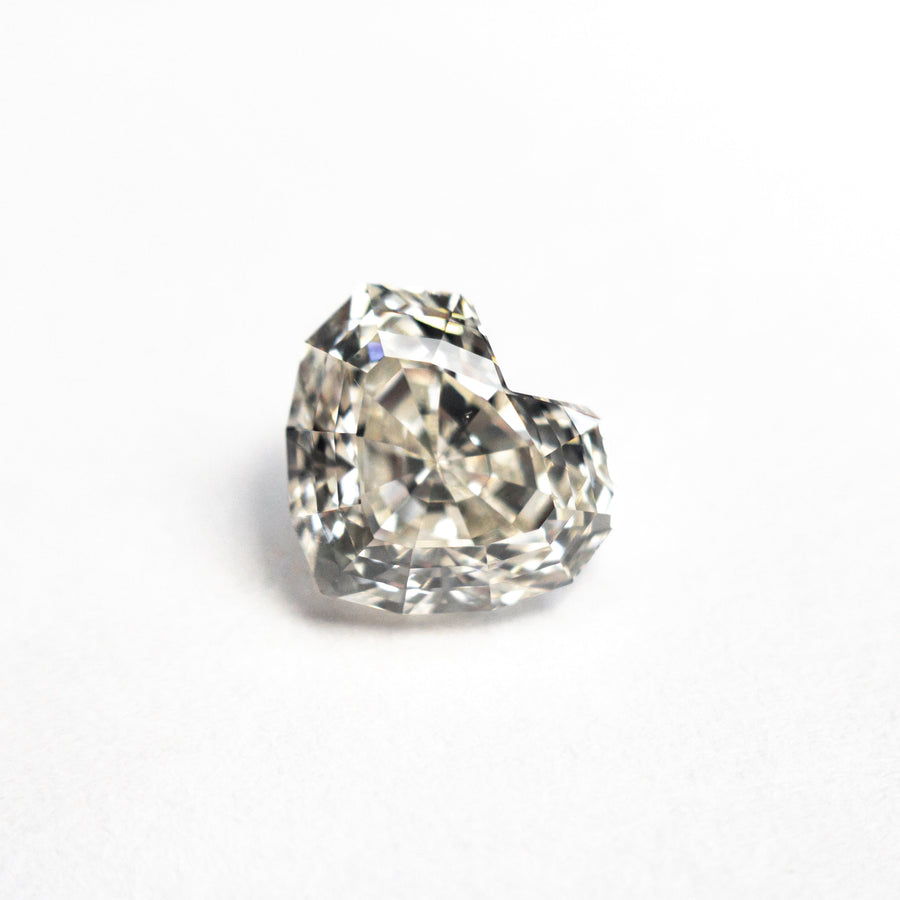 The 1.43ct 6.43x7.28x4.43mm GIA VS2 M Geo Heart Step Cut 26314-01 by East London jeweller Rachel Boston | Discover our collections of unique and timeless engagement rings, wedding rings, and modern fine jewellery. - Rachel Boston Jewellery