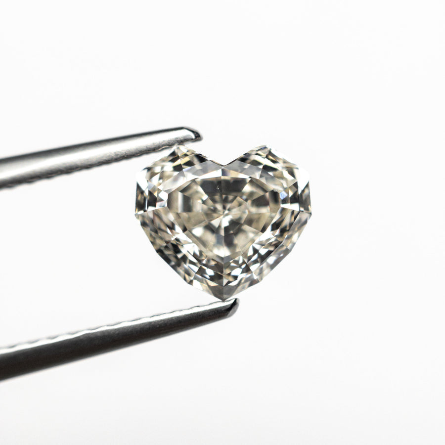 The 1.43ct 6.43x7.28x4.43mm GIA VS2 M Geo Heart Step Cut 26314-01 by East London jeweller Rachel Boston | Discover our collections of unique and timeless engagement rings, wedding rings, and modern fine jewellery. - Rachel Boston Jewellery