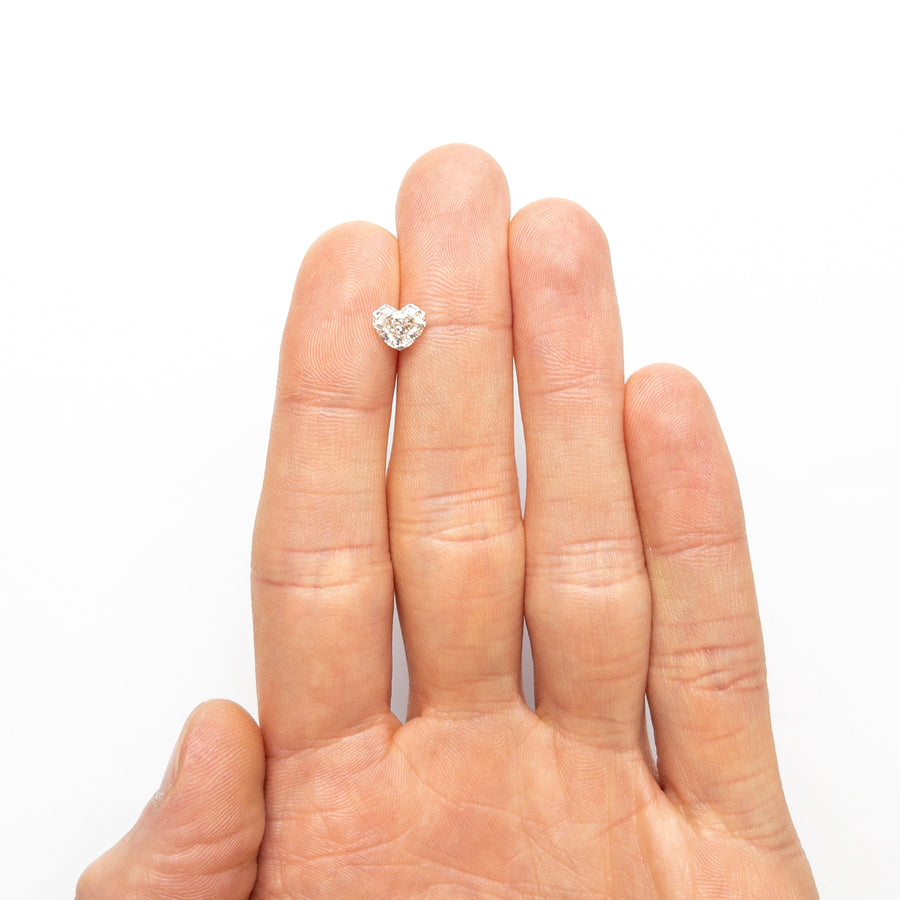 The 1.43ct 6.43x7.28x4.43mm GIA VS2 M Geo Heart Step Cut 26314-01 by East London jeweller Rachel Boston | Discover our collections of unique and timeless engagement rings, wedding rings, and modern fine jewellery. - Rachel Boston Jewellery