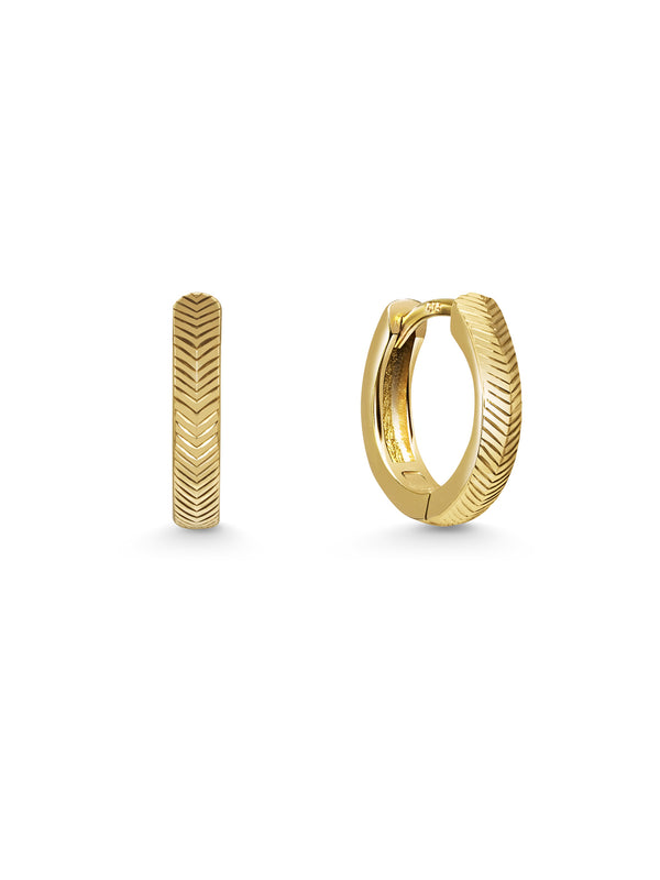 The 12.8mm Engraved Chevron Huggie Hoop Earrings by East London jeweller Rachel Boston | Discover our collections of unique and timeless engagement rings, wedding rings, and modern fine jewellery.