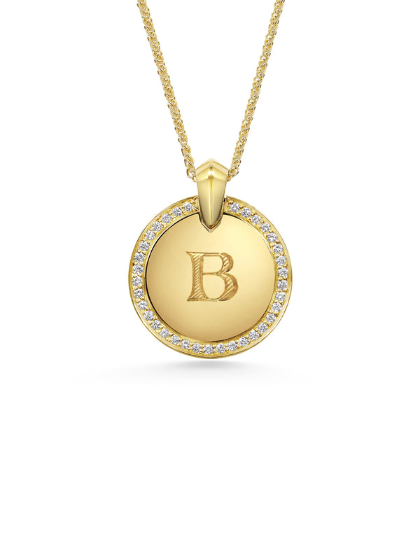 The Diamond Medallion Necklace by East London jeweller Rachel Boston | Discover our collections of unique and timeless engagement rings, wedding rings, and modern fine jewellery.