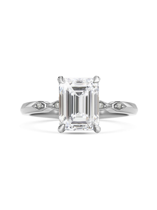 The Evelyn - Emerald Ring by East London jeweller Rachel Boston | Discover our collections of unique and timeless engagement rings, wedding rings, and modern fine jewellery.