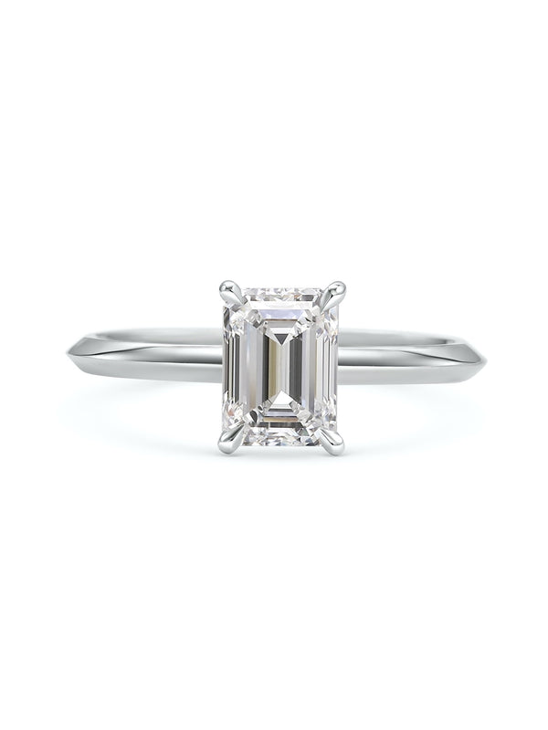 The Grace Ring - Emerald Cut by East London jeweller Rachel Boston | Discover our collections of unique and timeless engagement rings, wedding rings, and modern fine jewellery.