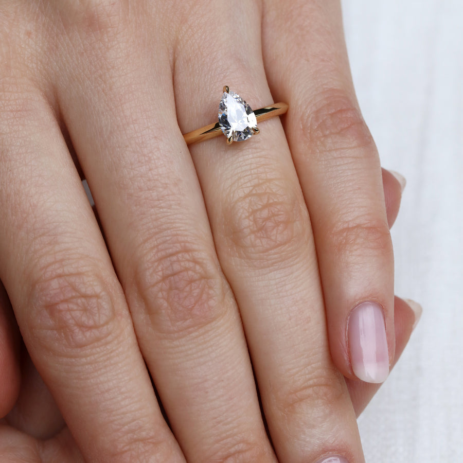 The Lyra Ring - Pear Cut by East London jeweller Rachel Boston | Discover our collections of unique and timeless engagement rings, wedding rings, and modern fine jewellery. - Rachel Boston Jewellery