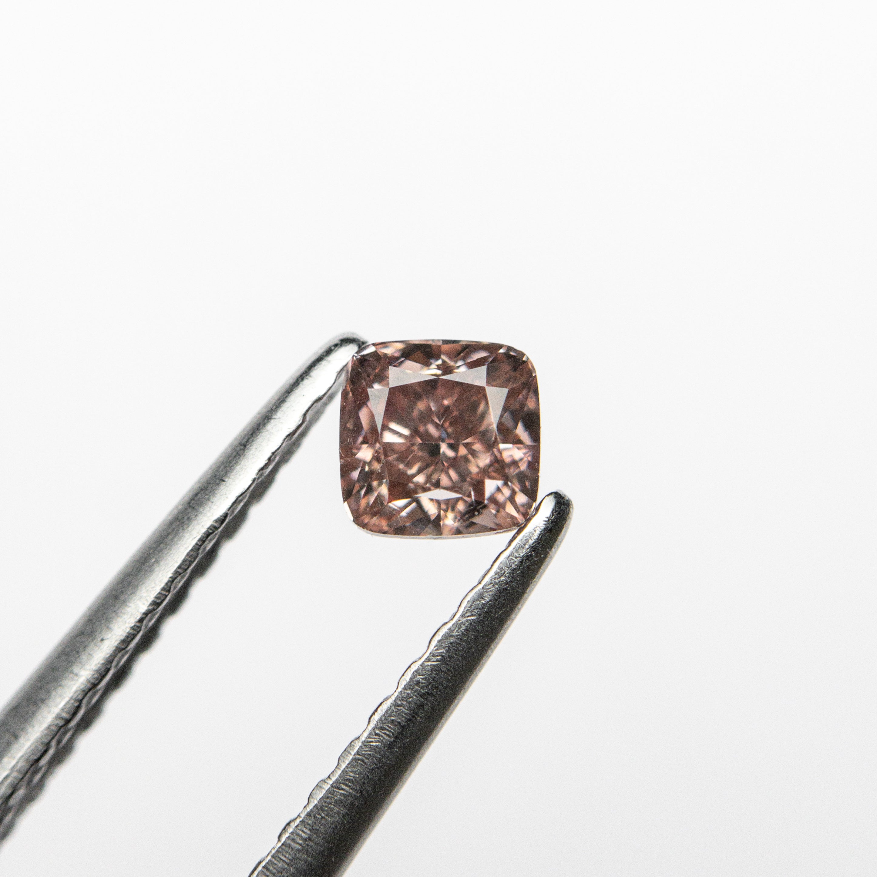 The 0.31ct 3.57x3.54x2.57mm GIA SI1 Fancy Deep Brownish Orangy Pink Cushion Brilliant 🇦🇺 24105-01 by East London jeweller Rachel Boston | Discover our collections of unique and timeless engagement rings, wedding rings, and modern fine jewellery.