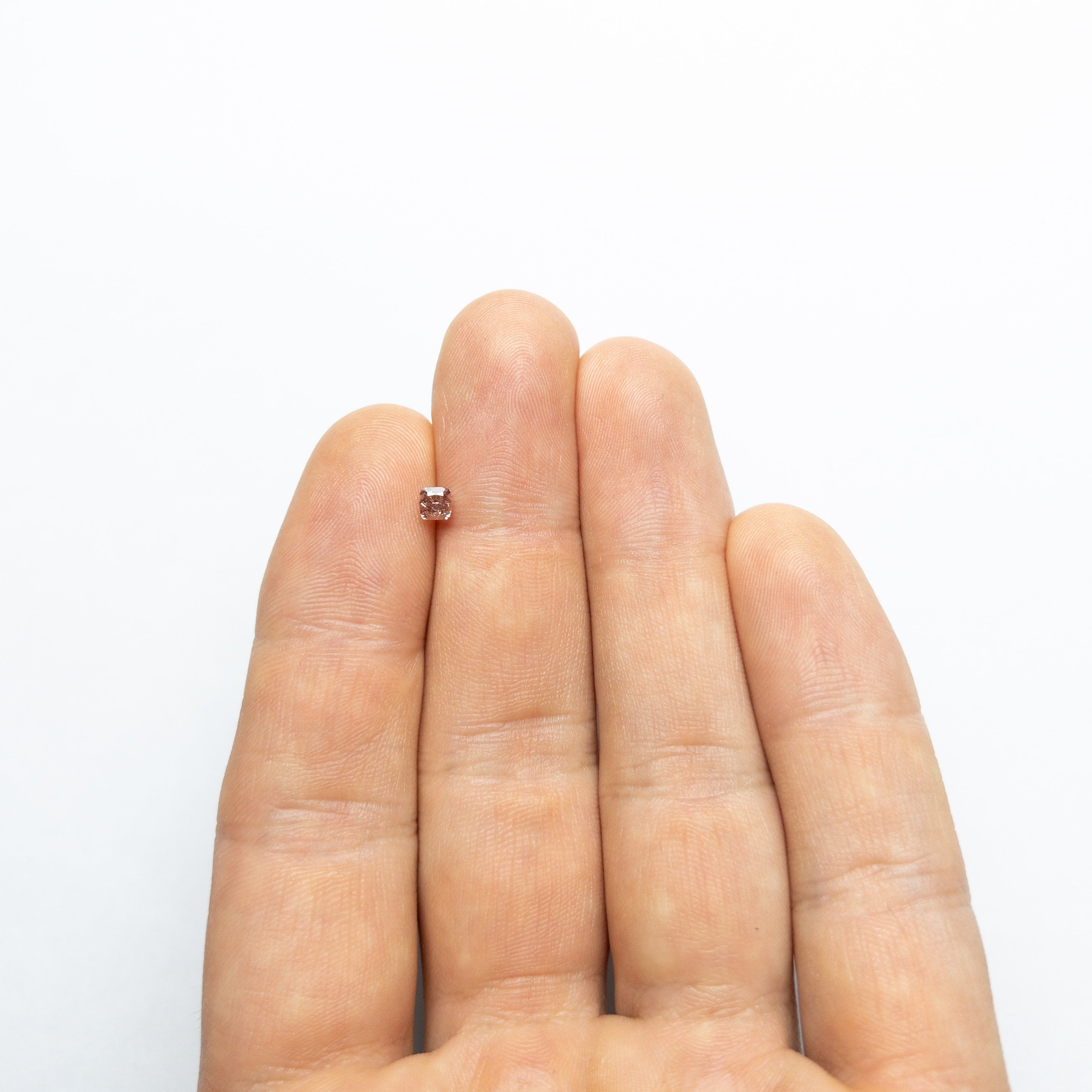 The 0.31ct 3.57x3.54x2.57mm GIA SI1 Fancy Deep Brownish Orangy Pink Cushion Brilliant 🇦🇺 24105-01 by East London jeweller Rachel Boston | Discover our collections of unique and timeless engagement rings, wedding rings, and modern fine jewellery.
