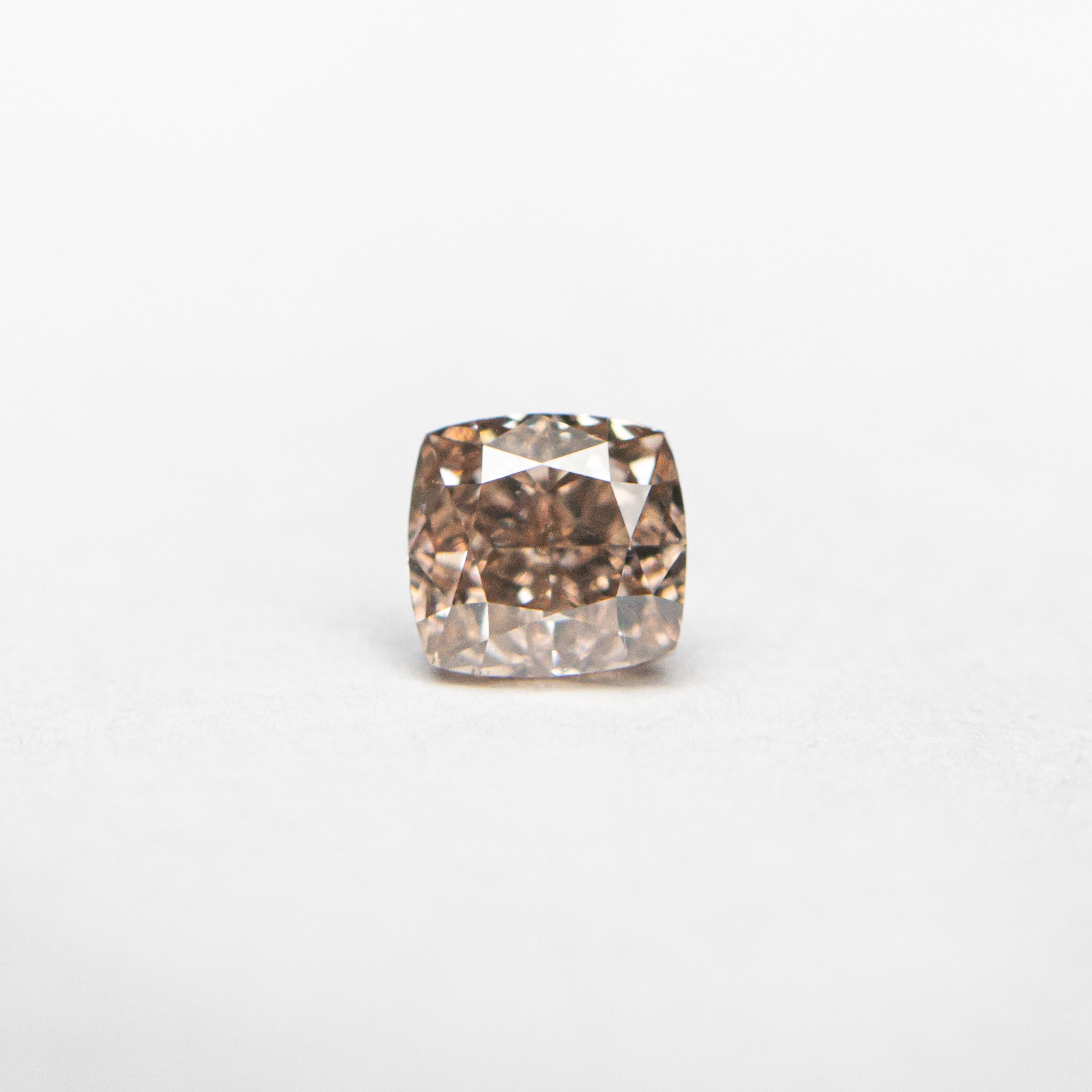 The 0.35ct 3.92x3.71x2.65mm GIA VS2 Fancy Brown-Pink Cushion Brilliant 🇦🇺 24124-01 by East London jeweller Rachel Boston | Discover our collections of unique and timeless engagement rings, wedding rings, and modern fine jewellery.
