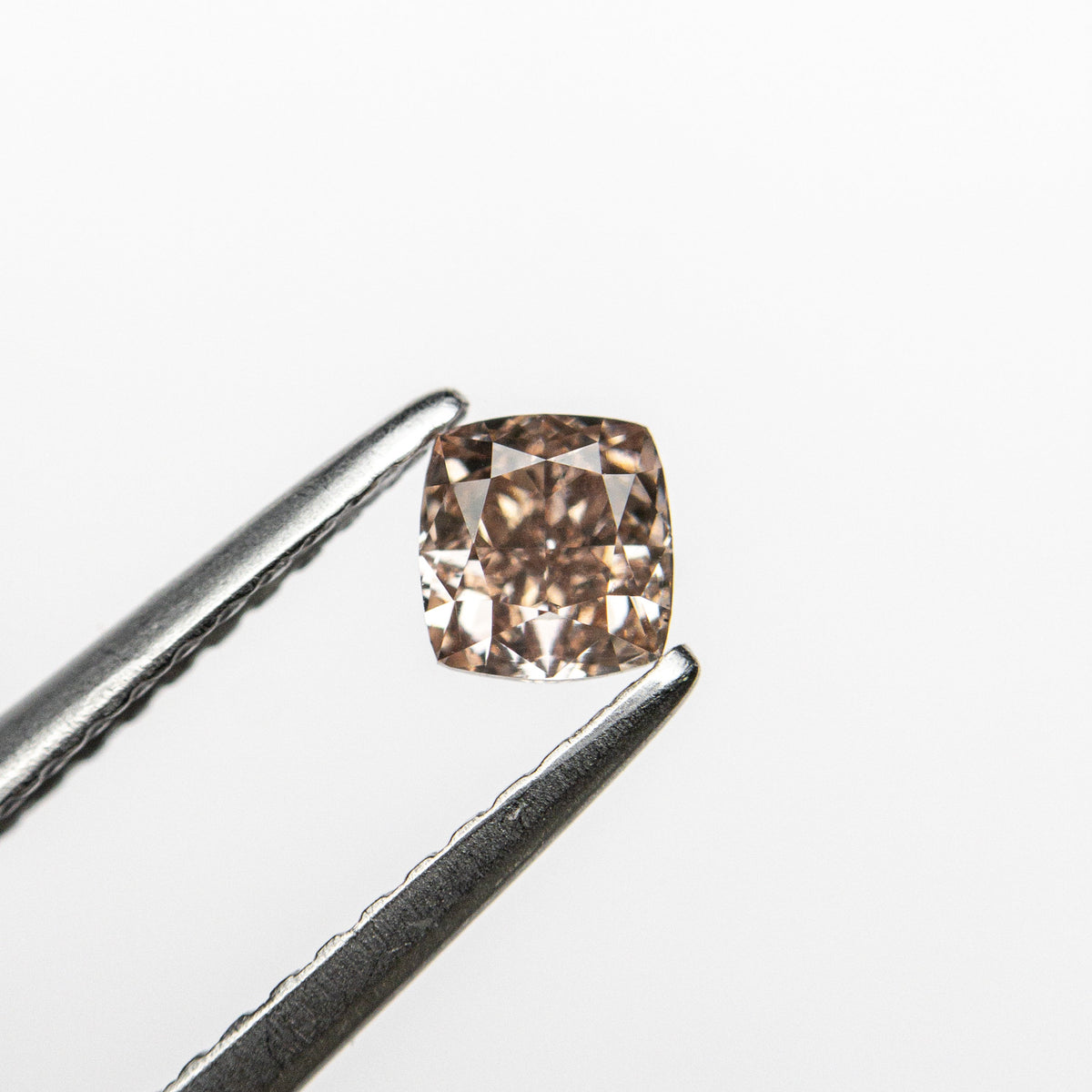 The 0.35ct 3.92x3.71x2.65mm GIA VS2 Fancy Brown-Pink Cushion Brilliant 🇦🇺 24124-01 by East London jeweller Rachel Boston | Discover our collections of unique and timeless engagement rings, wedding rings, and modern fine jewellery.