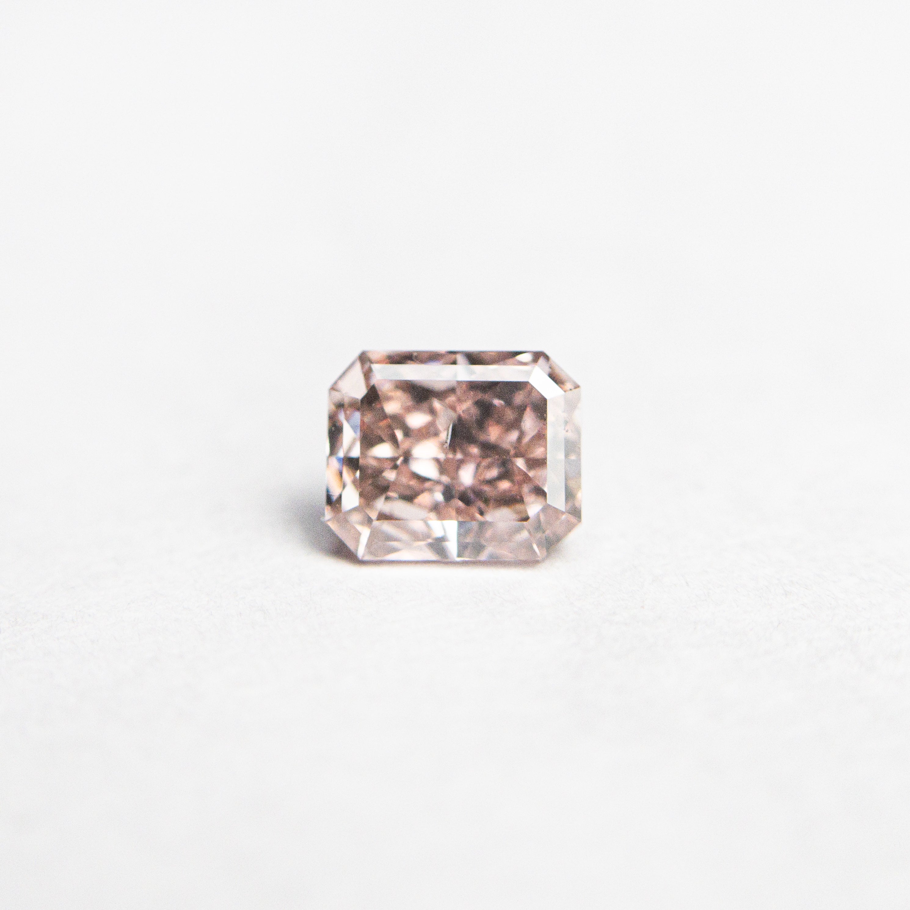 The 0.36ct 4.46x3.68x2.31mm GIA SI1 Fancy Orangy Pink Cut Corner Rectangle Brilliant 🇦🇺 24123-01 by East London jeweller Rachel Boston | Discover our collections of unique and timeless engagement rings, wedding rings, and modern fine jewellery.