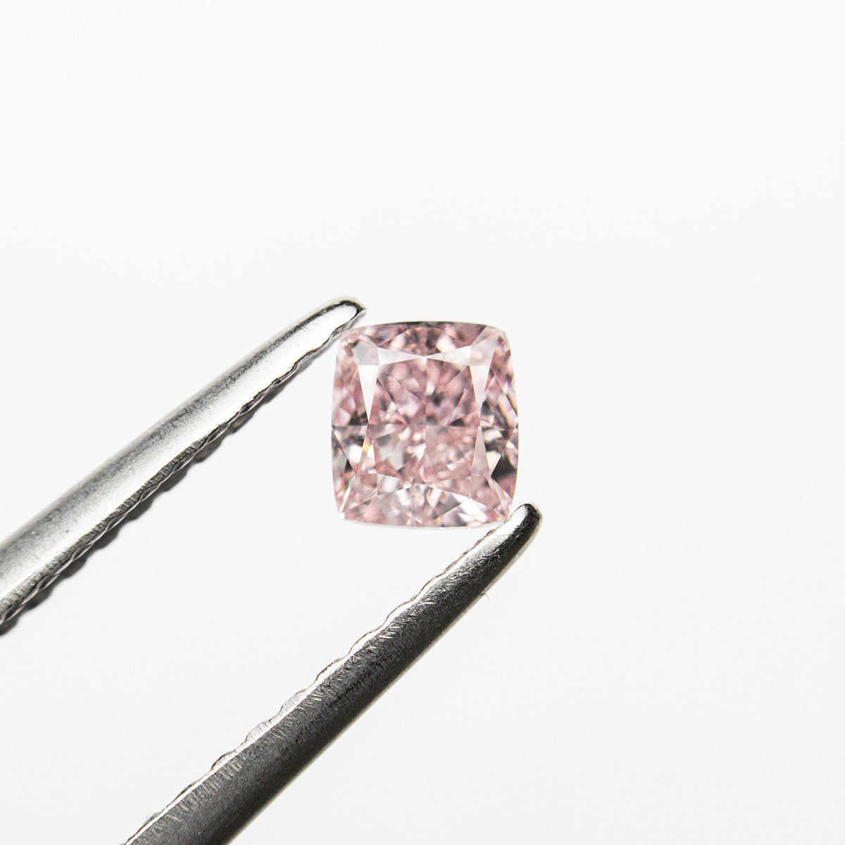The 0.37ct 4.02x3.60x2.65mm GIA SI2 Fancy Pink Cushion Brilliant 🇦🇺 24141-01 by East London jeweller Rachel Boston | Discover our collections of unique and timeless engagement rings, wedding rings, and modern fine jewellery.
