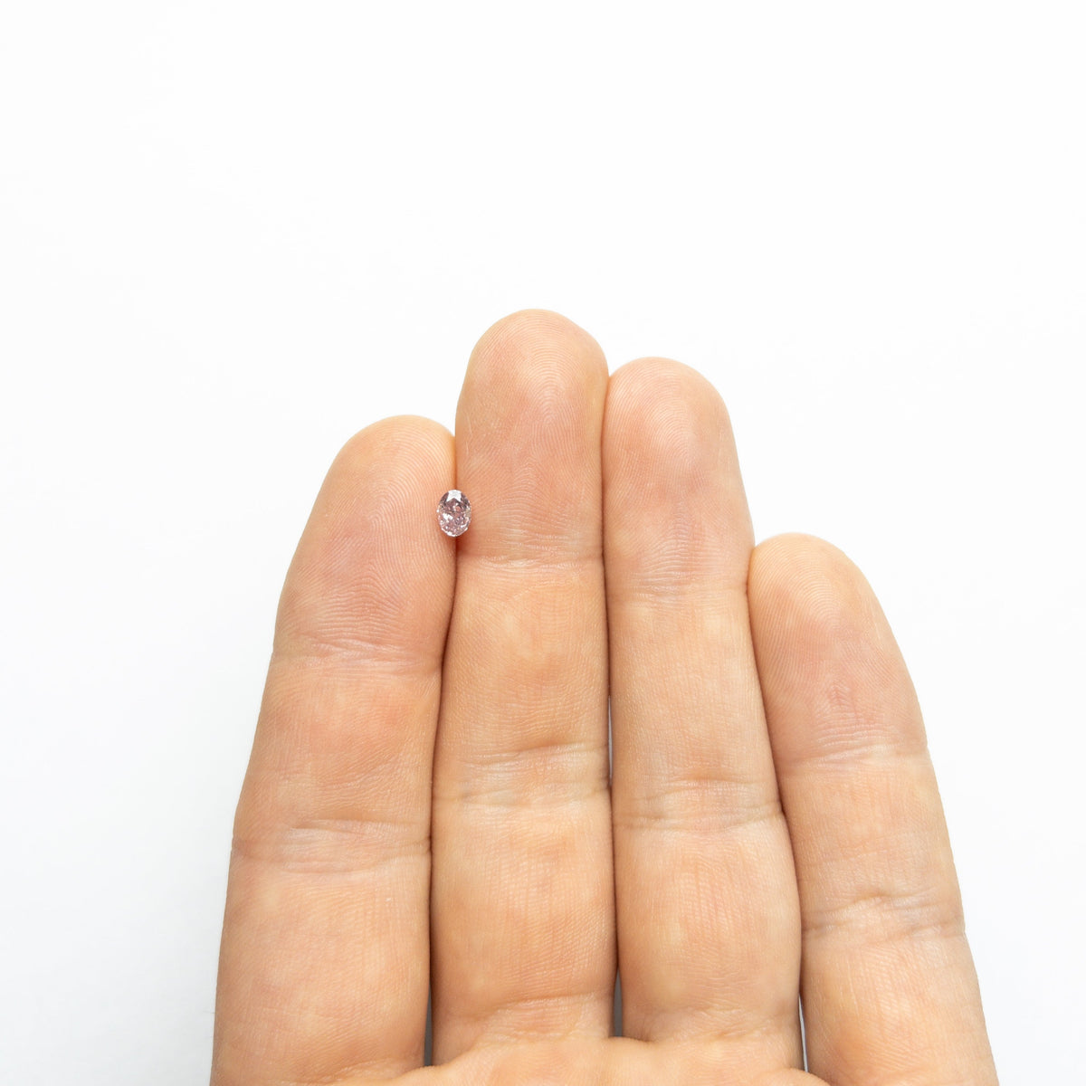 The 0.40ct 4.98x3.64x2.68mm GIA I1 Fancy Intense Purple-Pink Oval Brilliant 🇦🇺 24120-01 by East London jeweller Rachel Boston | Discover our collections of unique and timeless engagement rings, wedding rings, and modern fine jewellery.