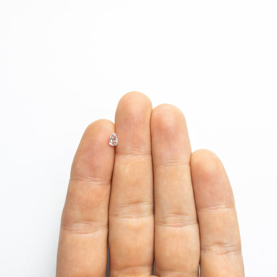 The 0.40ct 6.02x4.05x2.37mm GIA I1 Fancy Pink Pear Brilliant 🇦🇺 24128-01 by East London jeweller Rachel Boston | Discover our collections of unique and timeless engagement rings, wedding rings, and modern fine jewellery. - Rachel Boston Jewellery