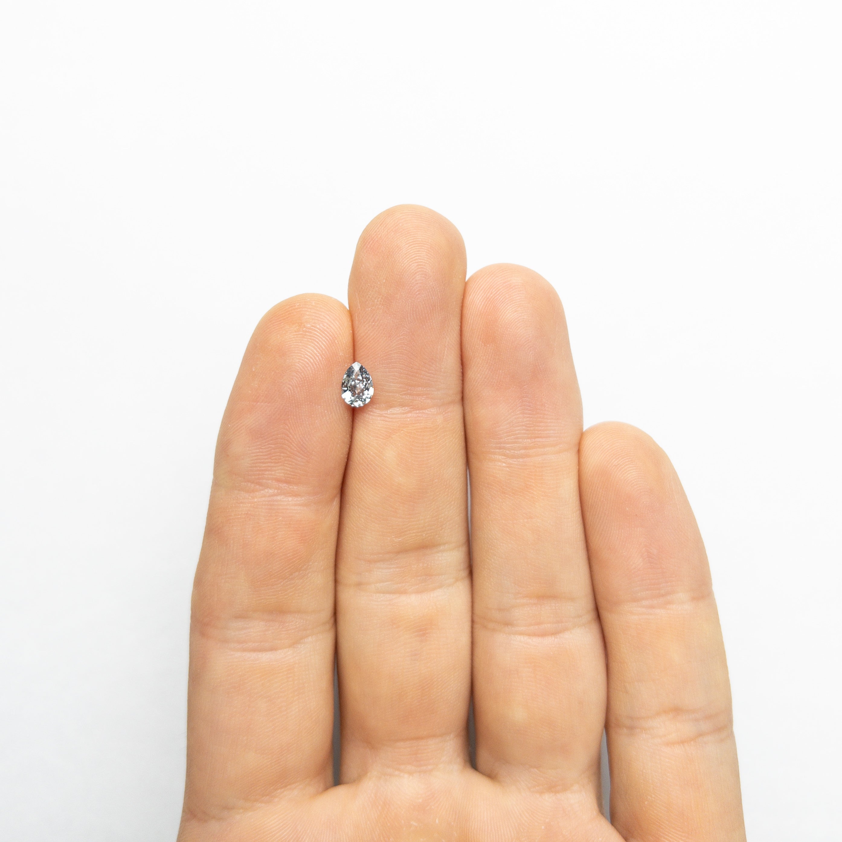 The 0.41ct 6.28x4.48x2.33mm GIA SI1 Fancy Intense Blue Pear Brilliant 24136-01 by East London jeweller Rachel Boston | Discover our collections of unique and timeless engagement rings, wedding rings, and modern fine jewellery.
