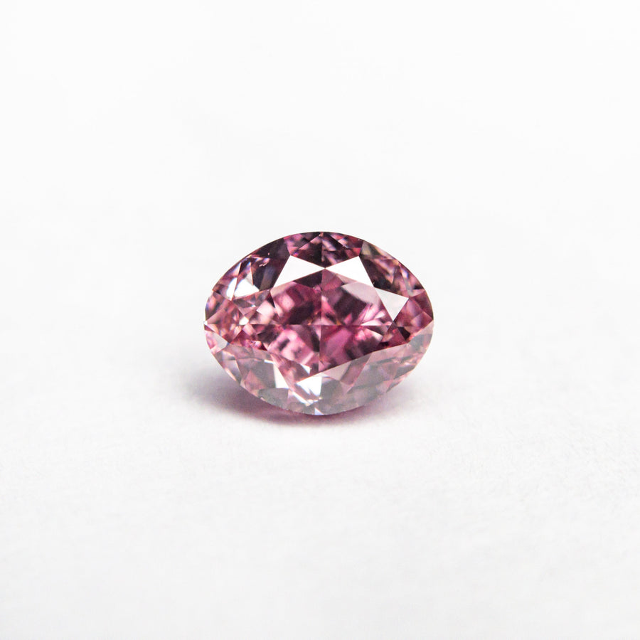 The 0.61ct 5.57x4.44x3.13mm GIA VS2 Fancy Vivid Purplish Pink Oval Brilliant 🇦🇺 24137-01 by East London jeweller Rachel Boston | Discover our collections of unique and timeless engagement rings, wedding rings, and modern fine jewellery. - Rachel Boston Jewellery