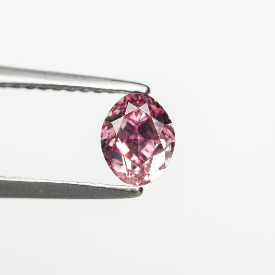 The 0.61ct 5.57x4.44x3.13mm GIA VS2 Fancy Vivid Purplish Pink Oval Brilliant 🇦🇺 24137-01 by East London jeweller Rachel Boston | Discover our collections of unique and timeless engagement rings, wedding rings, and modern fine jewellery. - Rachel Boston Jewellery