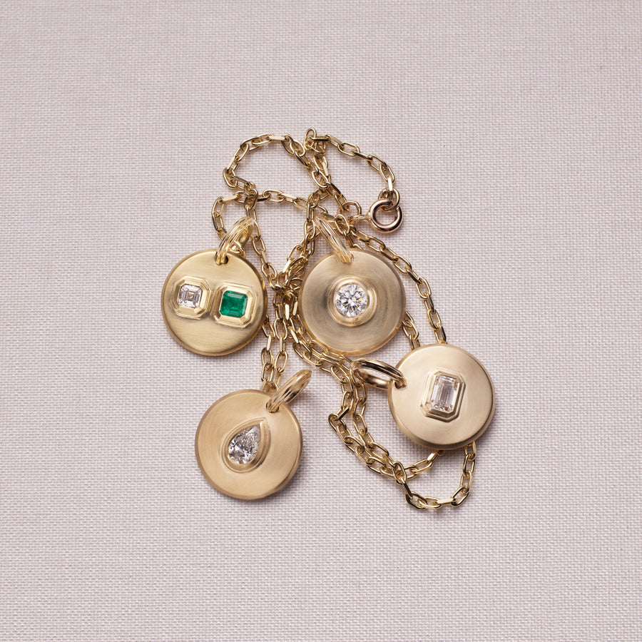 The RADIATE MEDALLION - TOI ET MOI by East London jeweller Rachel Boston | Discover our collections of unique and timeless engagement rings, wedding rings, and modern fine jewellery. - Rachel Boston Jewellery