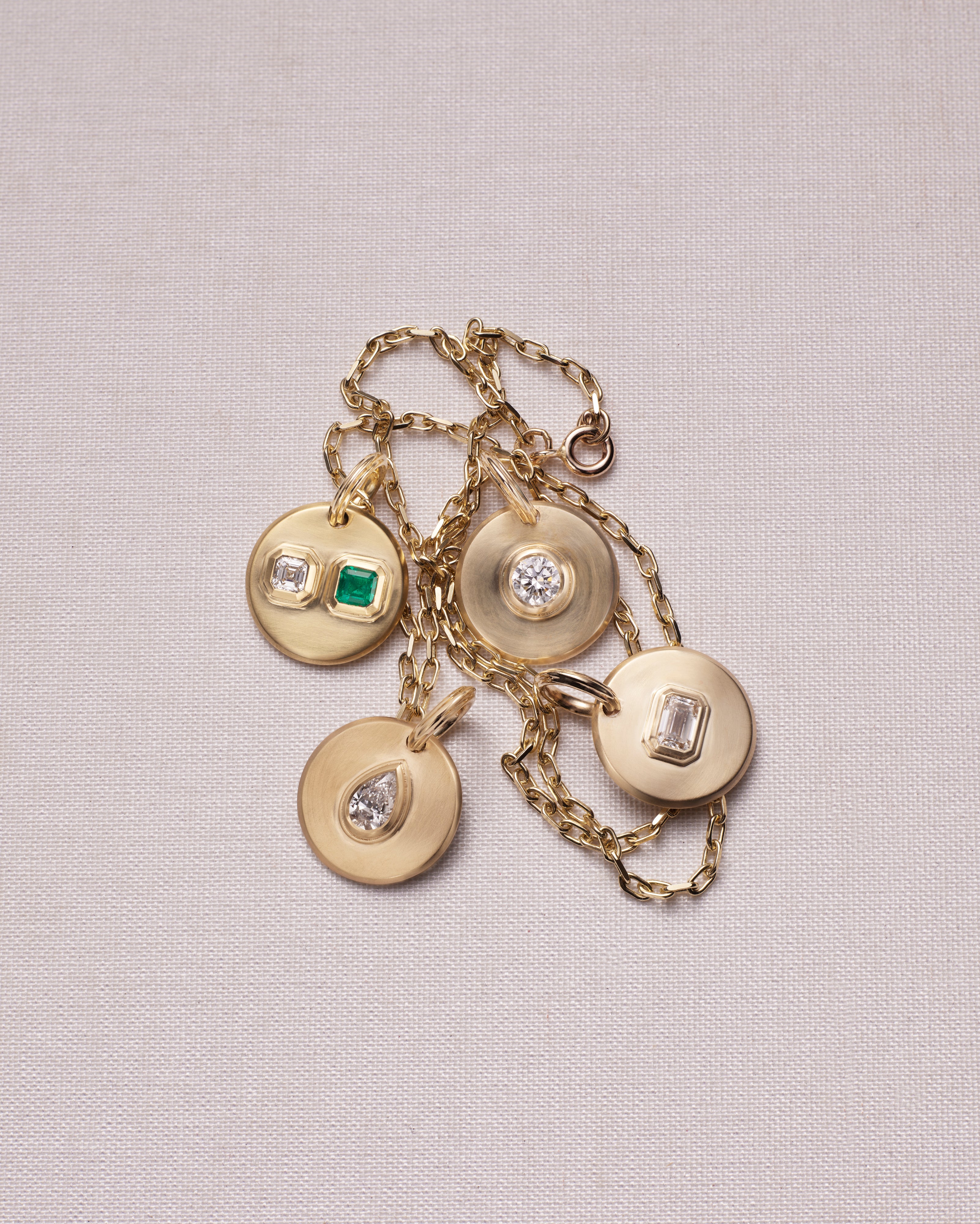 The Radiate Medallion - Toi et Moi by East London jeweller Rachel Boston | Discover our collections of unique and timeless engagement rings, wedding rings, and modern fine jewellery.