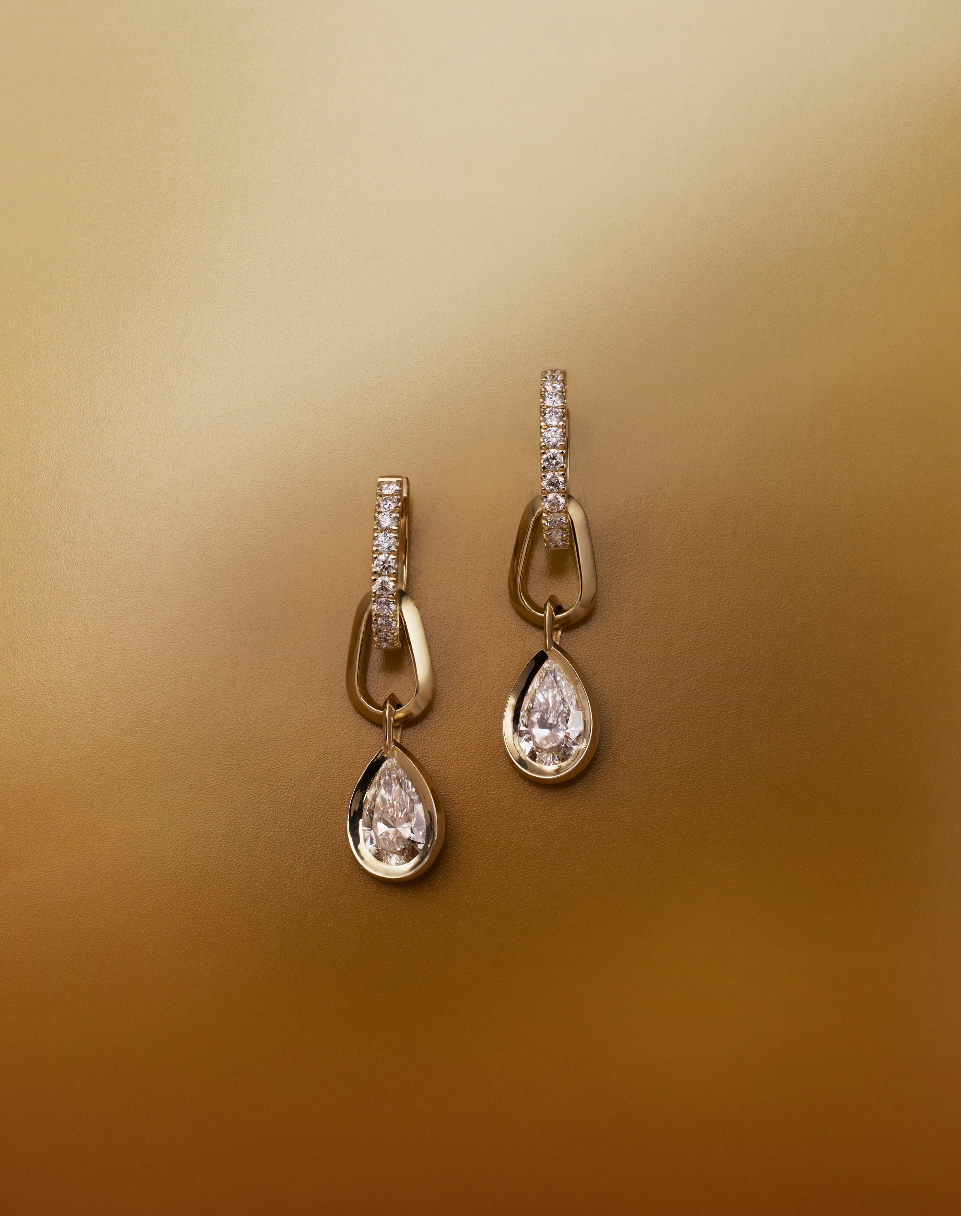 The Flow Earrings by East London jeweller Rachel Boston | Discover our collections of unique and timeless engagement rings, wedding rings, and modern fine jewellery.