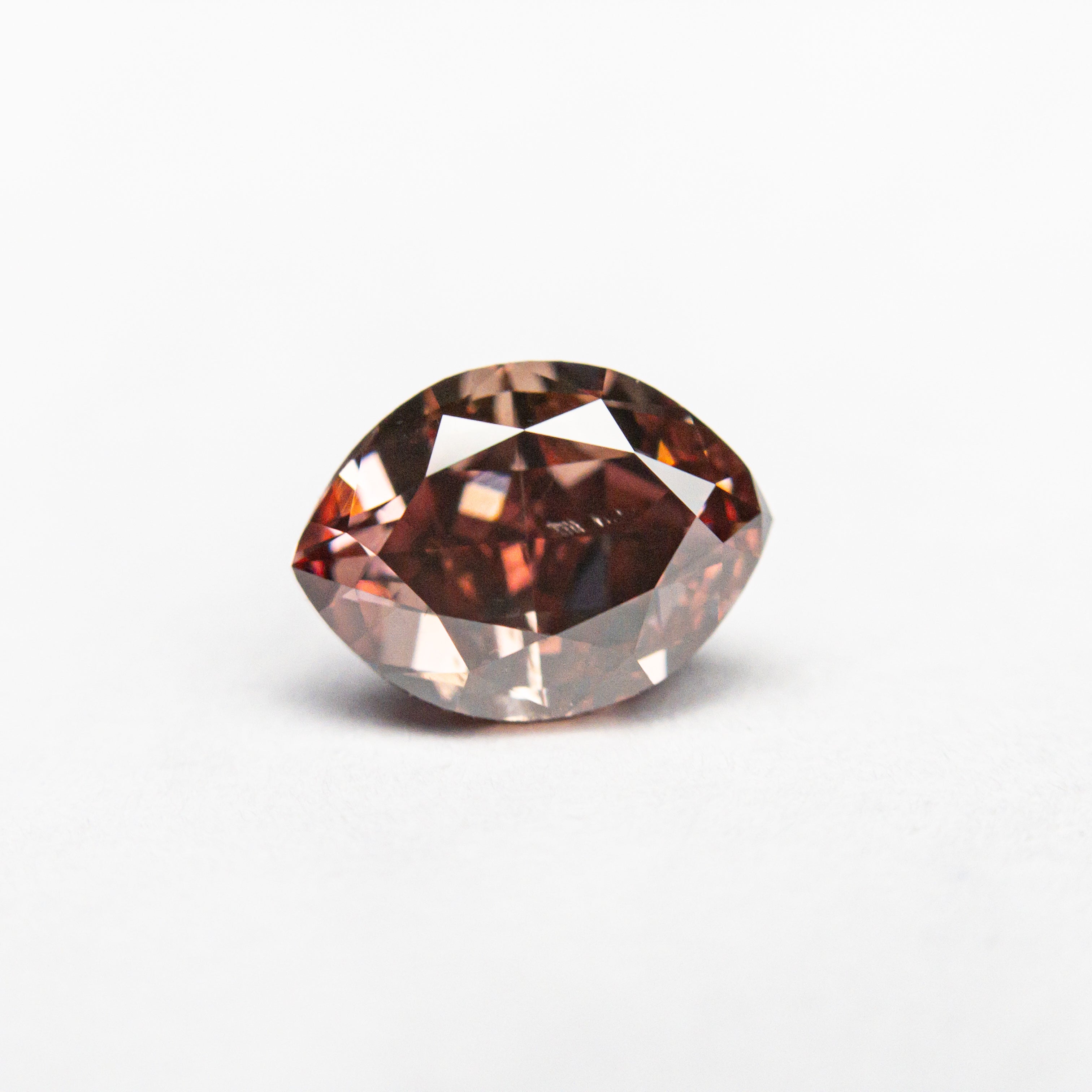 The 1.00ct 7.28x5.36x3.53mm GIA SI1 Fancy Deep Orangy Pink Marquise Brilliant 🇦🇺 24109-01 by East London jeweller Rachel Boston | Discover our collections of unique and timeless engagement rings, wedding rings, and modern fine jewellery.