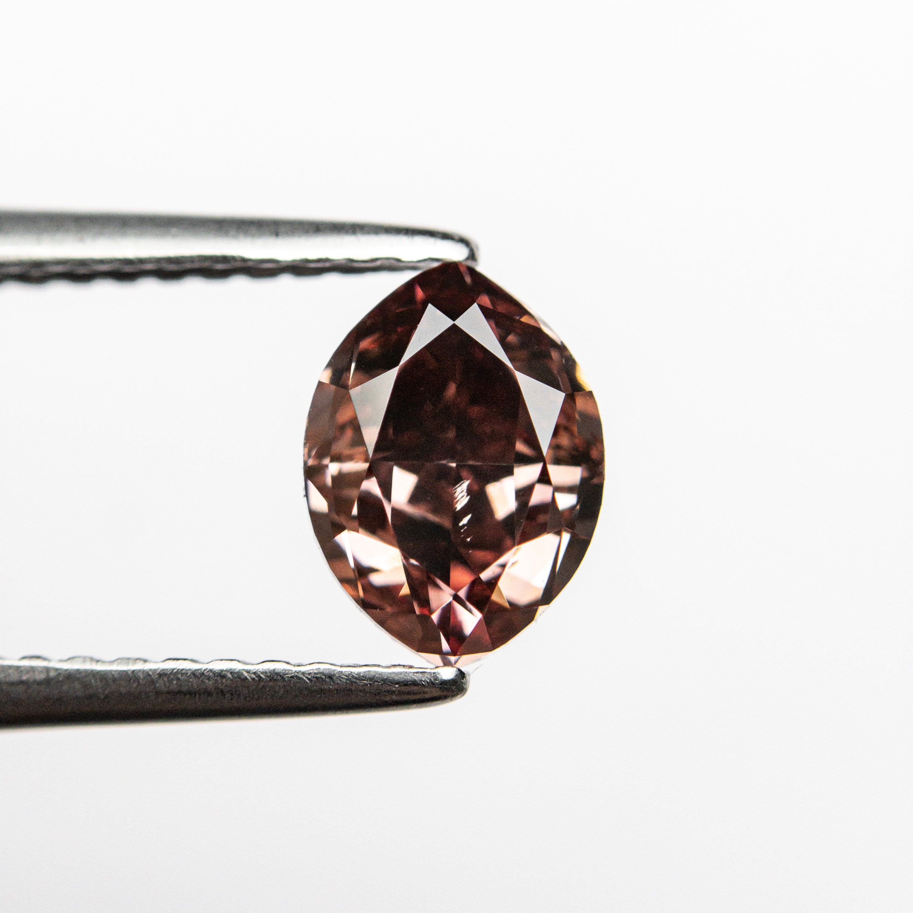 The 1.00ct 7.28x5.36x3.53mm GIA SI1 Fancy Deep Orangy Pink Marquise Brilliant 🇦🇺 24109-01 by East London jeweller Rachel Boston | Discover our collections of unique and timeless engagement rings, wedding rings, and modern fine jewellery.