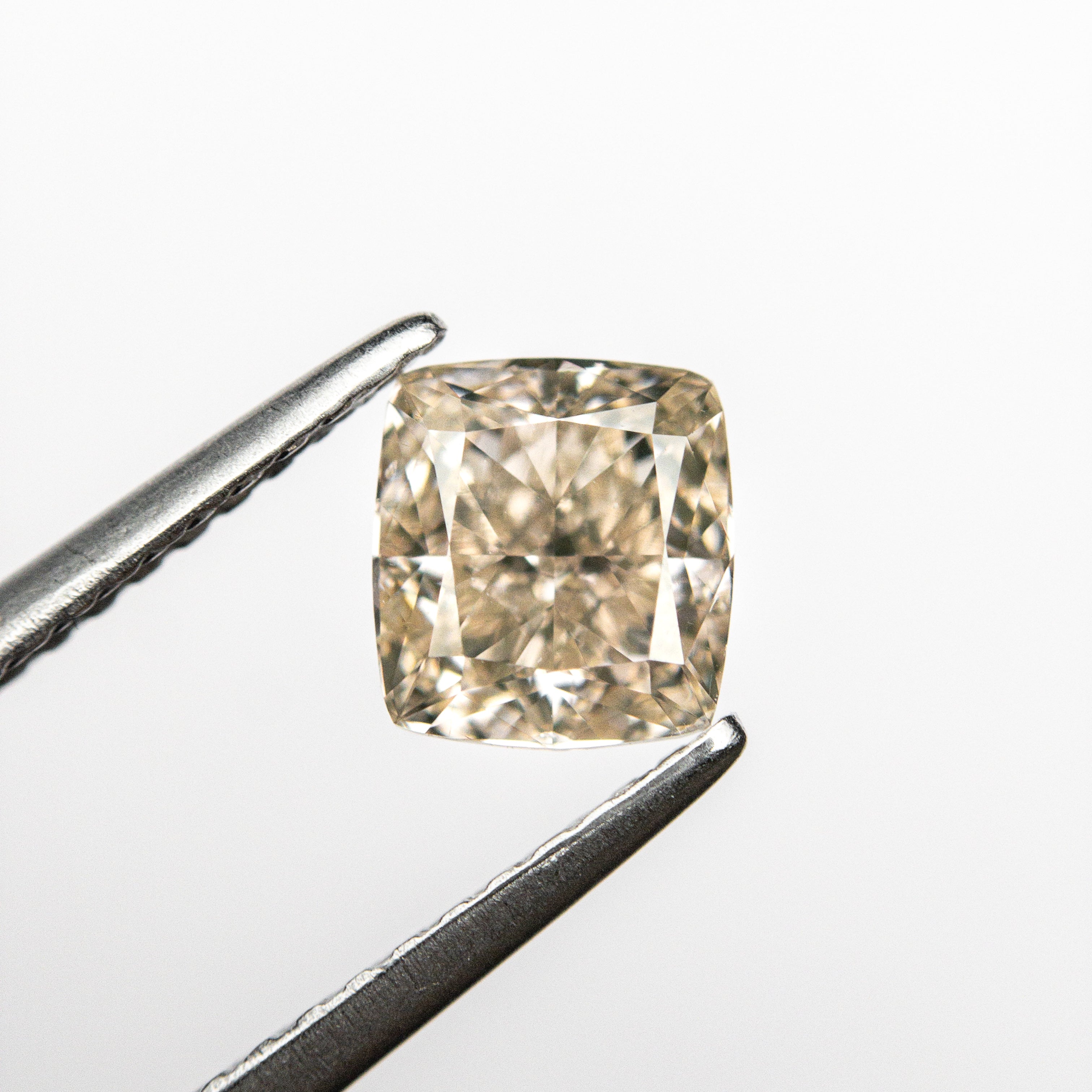 The 1.03ct 5.84x5.36x3.52mm GIA SI1 O-P Cushion Brilliant 🇦🇺 24114-01 by East London jeweller Rachel Boston | Discover our collections of unique and timeless engagement rings, wedding rings, and modern fine jewellery.