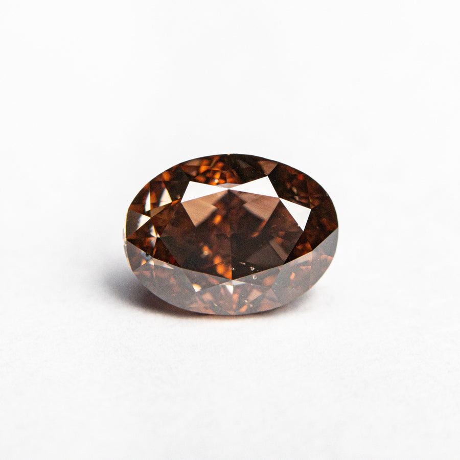 The 1.50ct 7.69x5.74x4.16mm GIA SI1 Fancy Deep Brown-Pink Oval Brilliant 🇦🇺 24161-01 by East London jeweller Rachel Boston | Discover our collections of unique and timeless engagement rings, wedding rings, and modern fine jewellery. - Rachel Boston Jewellery