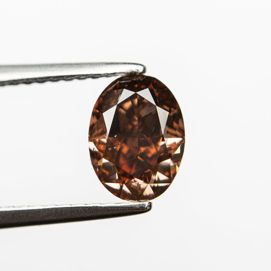 The 1.50ct 7.69x5.74x4.16mm GIA SI1 Fancy Deep Brown-Pink Oval Brilliant 🇦🇺 24161-01 by East London jeweller Rachel Boston | Discover our collections of unique and timeless engagement rings, wedding rings, and modern fine jewellery. - Rachel Boston Jewellery