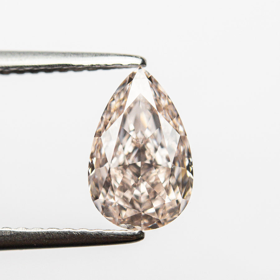 The 1.61ct 9.36x5.89x3.89mm GIA Internally Flawless Fancy Light Brownish Pink Pear Brilliant 24160-01 by East London jeweller Rachel Boston | Discover our collections of unique and timeless engagement rings, wedding rings, and modern fine jewellery. - Rachel Boston Jewellery