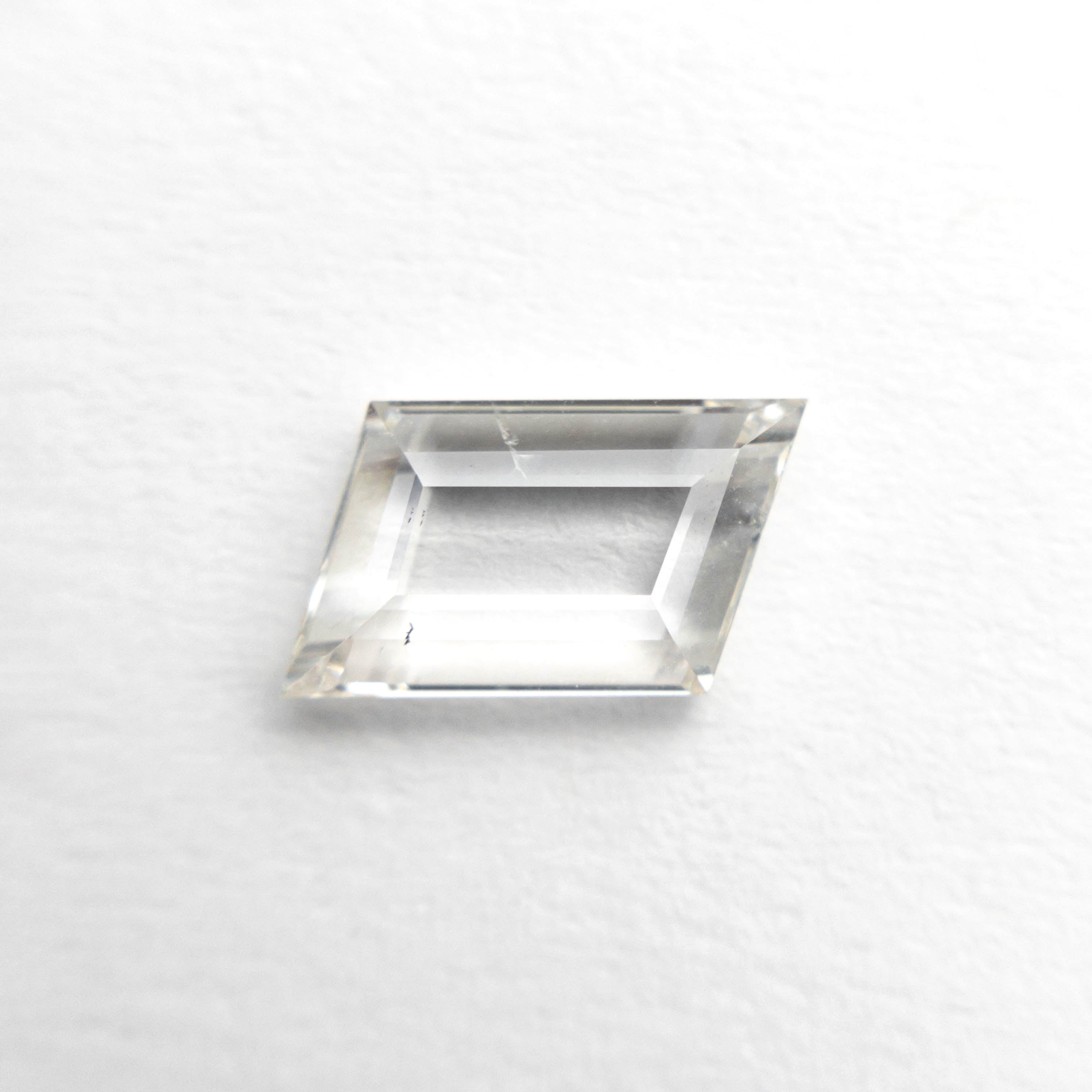 The 1.07ct 10.32x5.04x2.18mm Geometric Portrait Cut 18069-03 by East London jeweller Rachel Boston | Discover our collections of unique and timeless engagement rings, wedding rings, and modern fine jewellery.