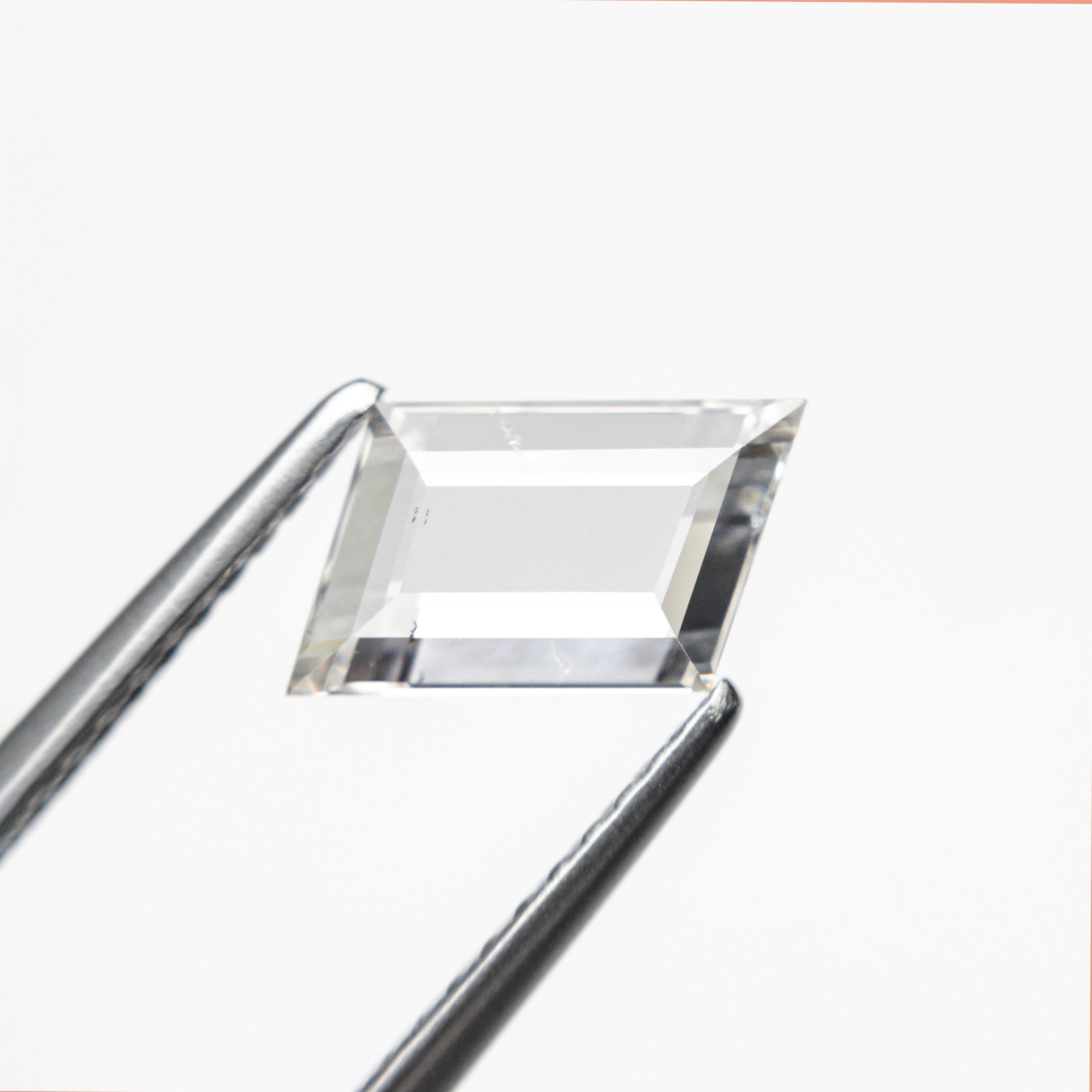 The 1.07ct 10.32x5.04x2.18mm Geometric Portrait Cut 18069-03 by East London jeweller Rachel Boston | Discover our collections of unique and timeless engagement rings, wedding rings, and modern fine jewellery.