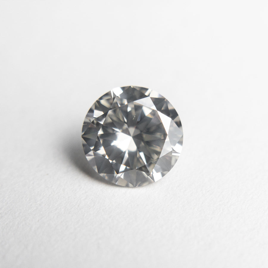 The 1.21ct 7.01x7.00x3.95mm Fancy Grey Round Brilliant 18473-01 by East London jeweller Rachel Boston | Discover our collections of unique and timeless engagement rings, wedding rings, and modern fine jewellery. - Rachel Boston Jewellery