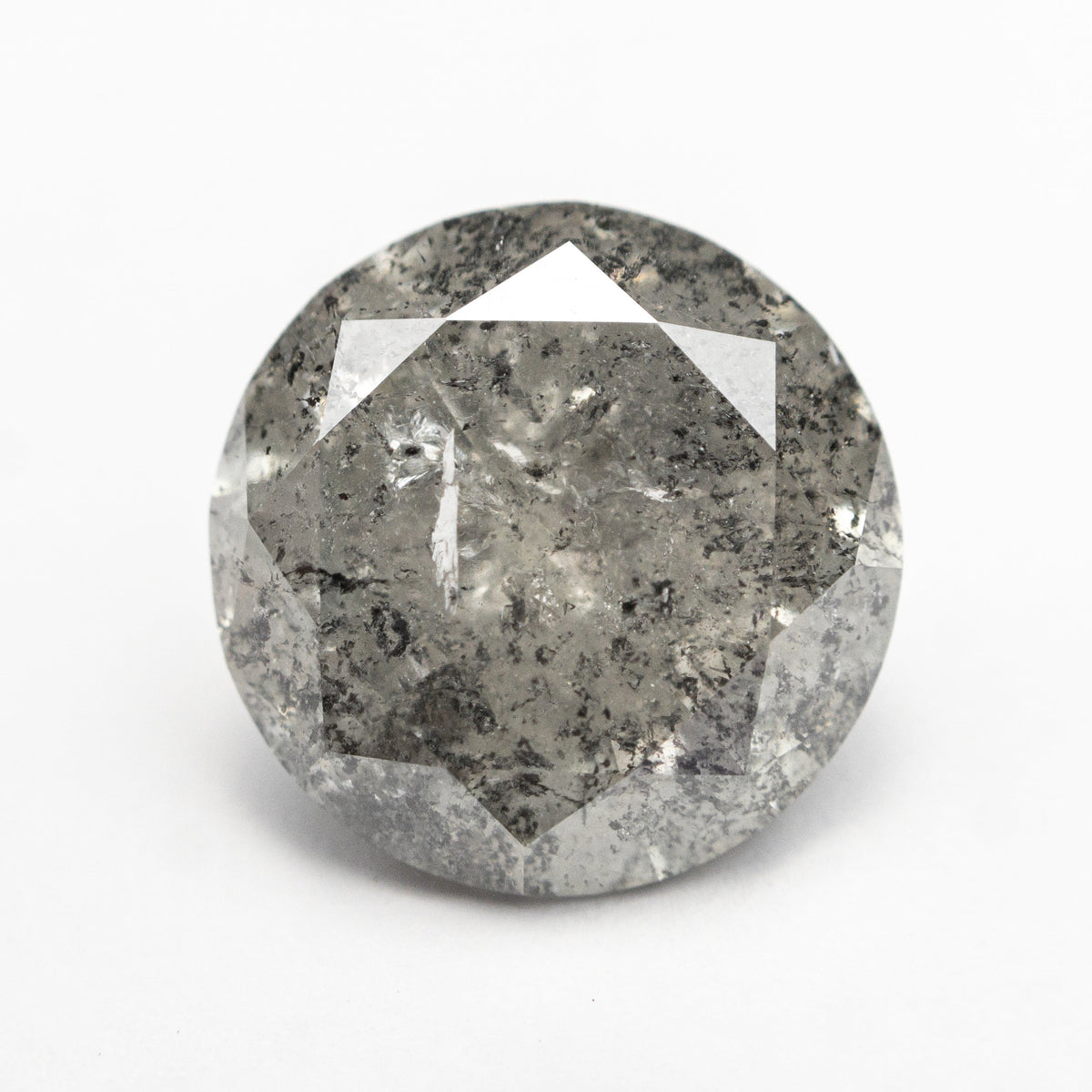 The 5.59ct 11.43x11.50x6.62mm Round Brilliant 18494-06 by East London jeweller Rachel Boston | Discover our collections of unique and timeless engagement rings, wedding rings, and modern fine jewellery.