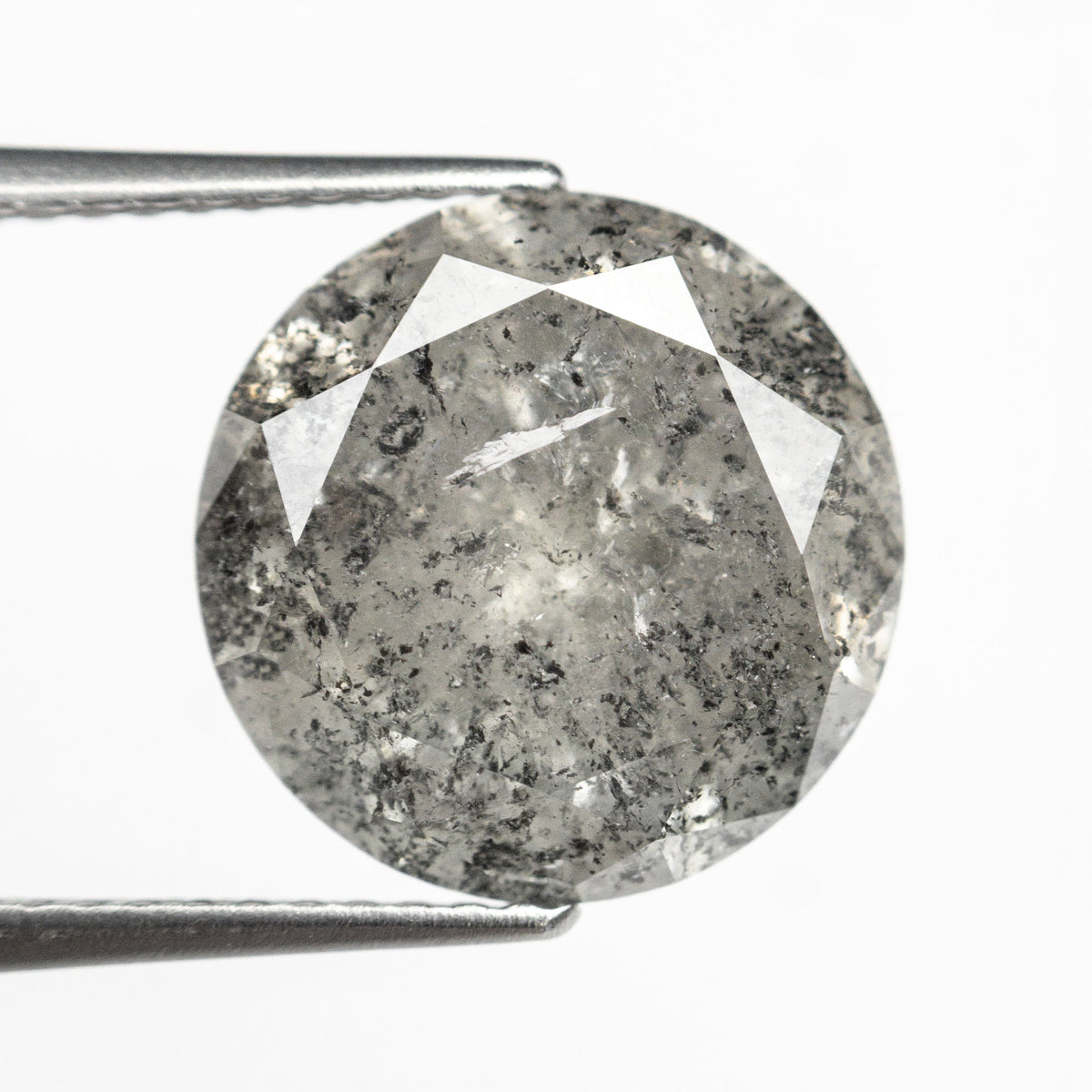 The 5.59ct 11.43x11.50x6.62mm Round Brilliant 18494-06 by East London jeweller Rachel Boston | Discover our collections of unique and timeless engagement rings, wedding rings, and modern fine jewellery.
