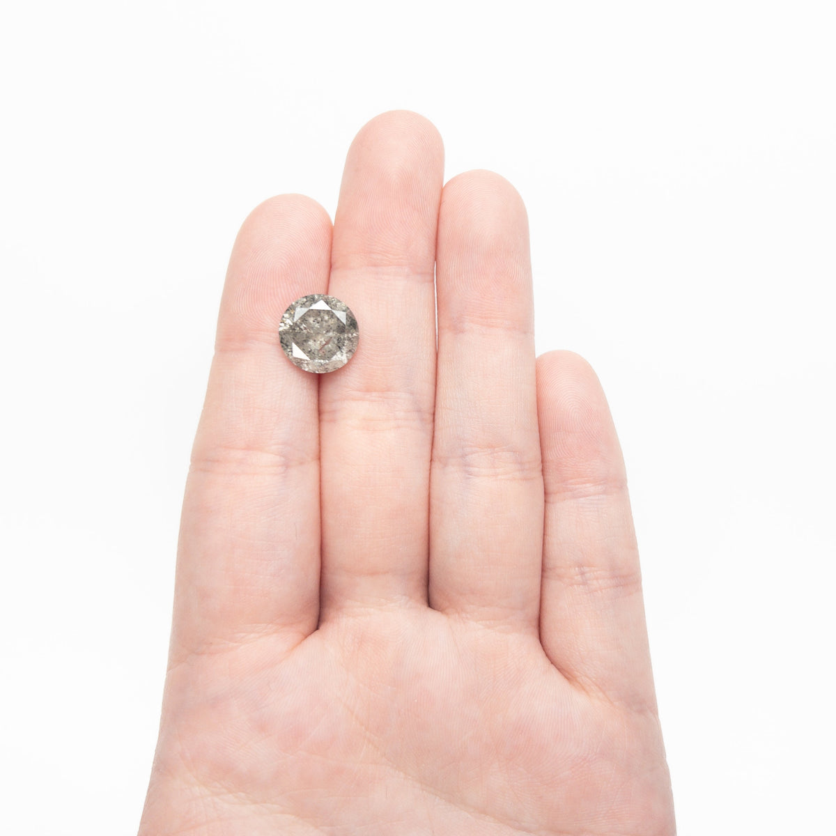The 5.59ct 11.43x11.50x6.62mm Round Brilliant 18494-06 by East London jeweller Rachel Boston | Discover our collections of unique and timeless engagement rings, wedding rings, and modern fine jewellery.
