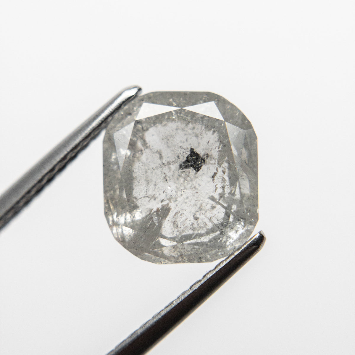 The 2.77ct 9.12x8.15x3.65mm Cushion Rosecut 18727-04 by East London jeweller Rachel Boston | Discover our collections of unique and timeless engagement rings, wedding rings, and modern fine jewellery.