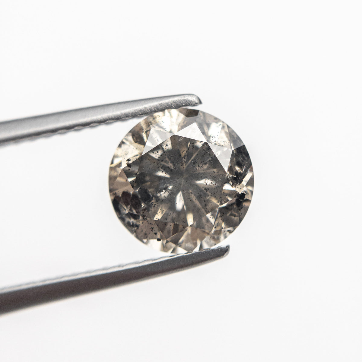 The 1.72ct 7.57x7.56x5.05mm Round Brilliant 18771-03 by East London jeweller Rachel Boston | Discover our collections of unique and timeless engagement rings, wedding rings, and modern fine jewellery.