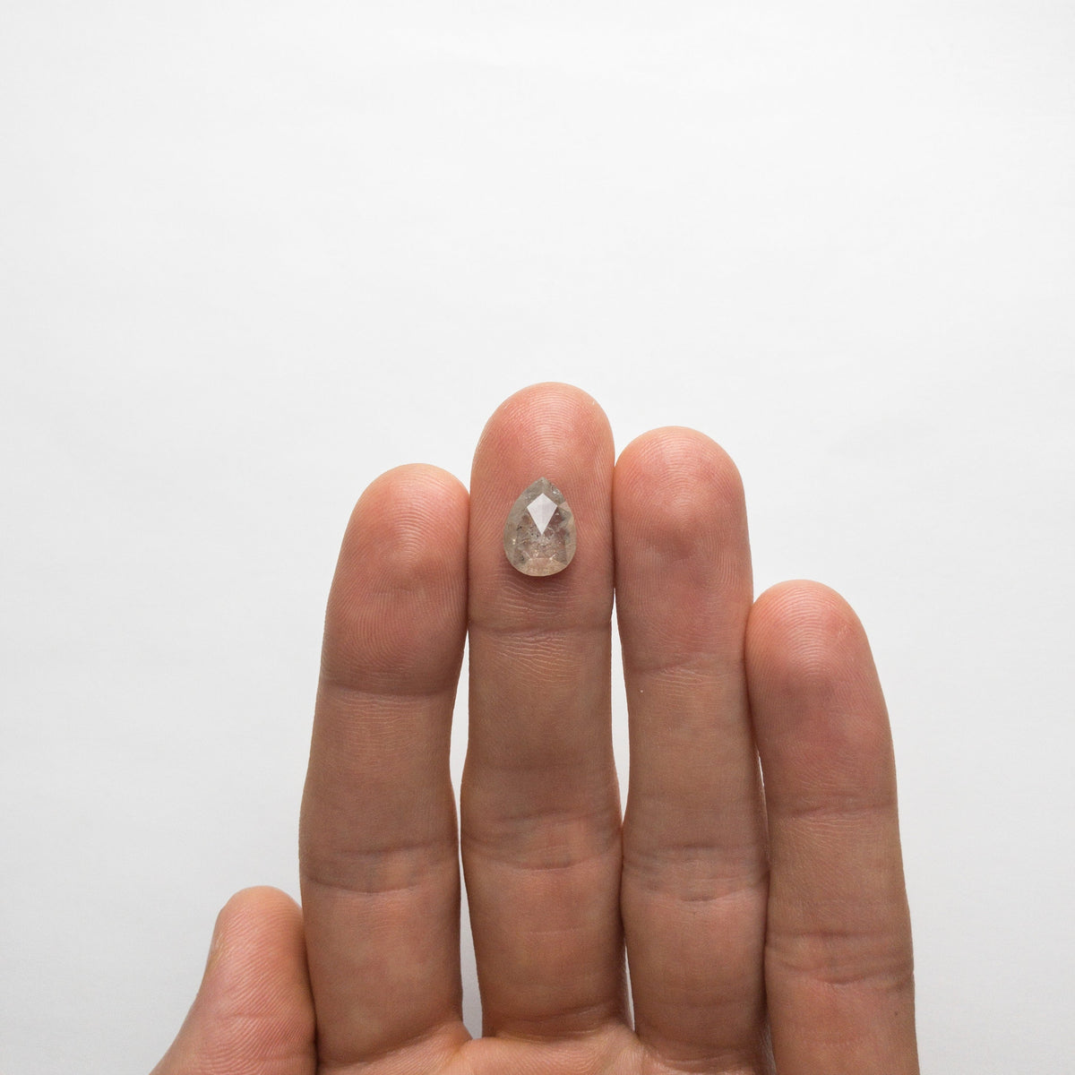 The 2.90ct 11.49x8.50x3.65mm Pear Rosecut 18790-03 by East London jeweller Rachel Boston | Discover our collections of unique and timeless engagement rings, wedding rings, and modern fine jewellery.