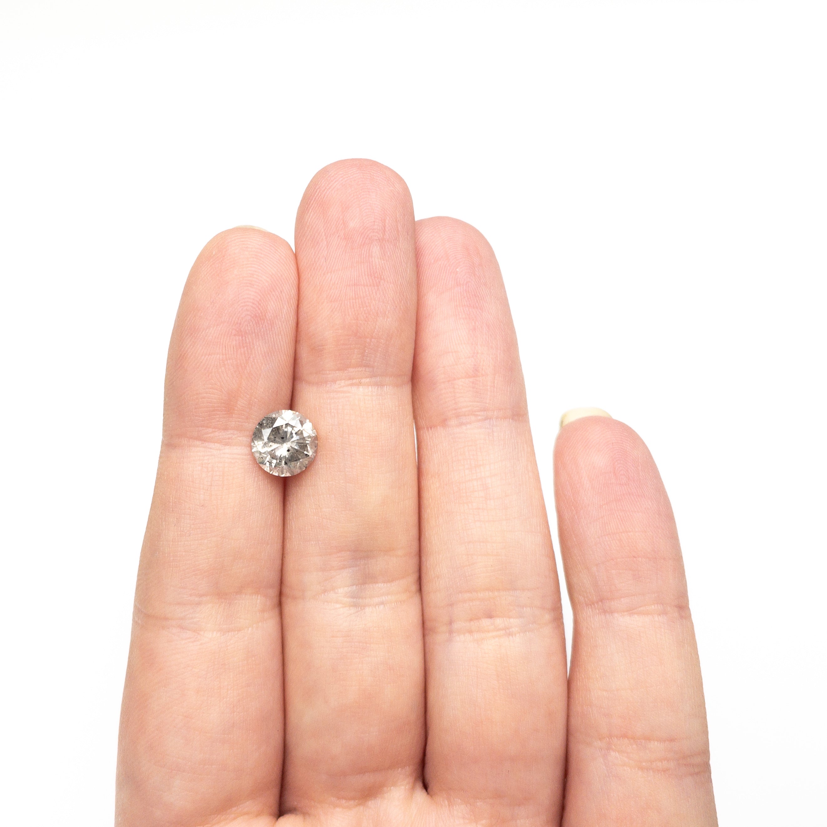 The 2.04ct 7.87x7.84x5.12mm Round Brilliant 18791-02 by East London jeweller Rachel Boston | Discover our collections of unique and timeless engagement rings, wedding rings, and modern fine jewellery.