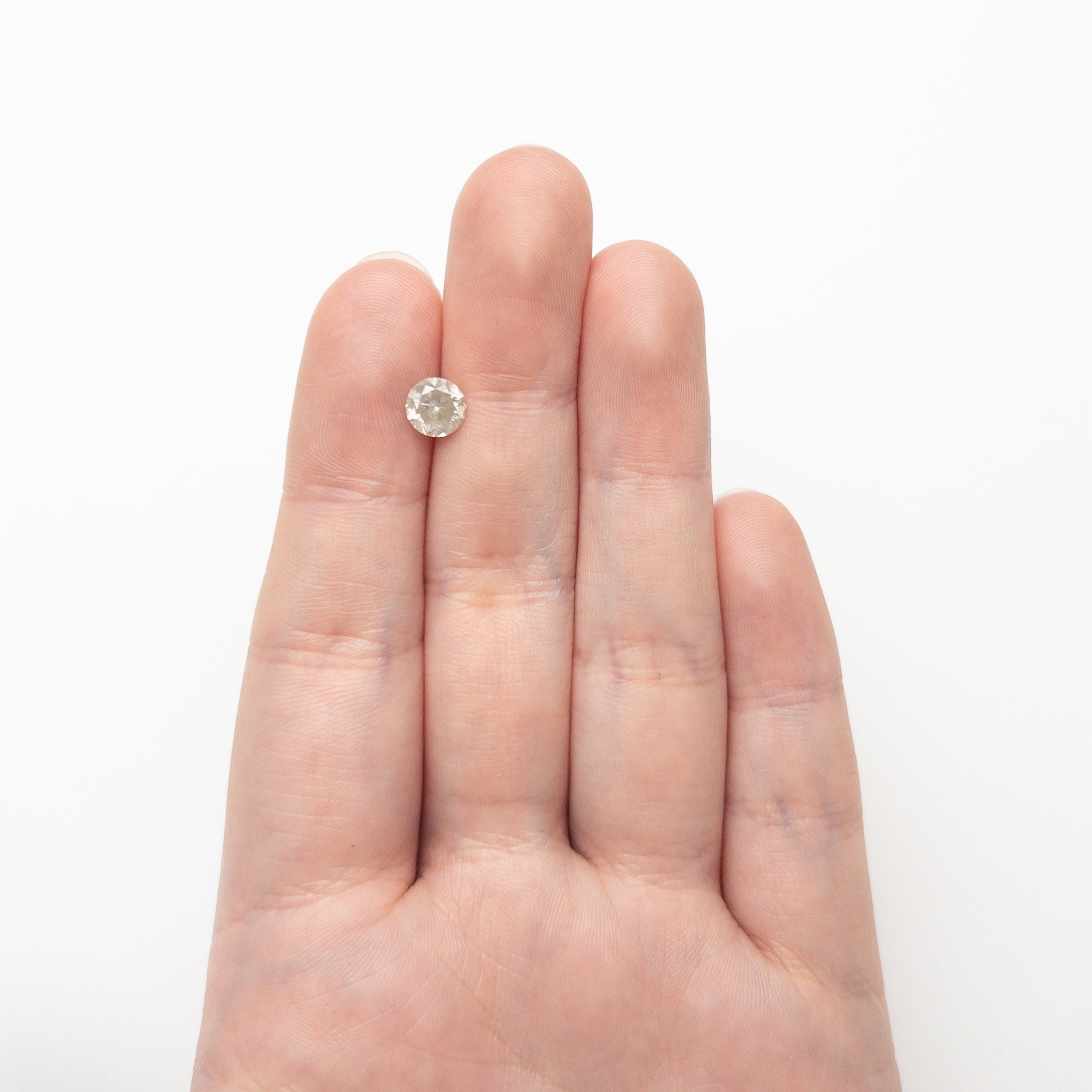 The 1.12ct 6.35x6.30x4.22mm Round Brilliant 19755-01 by East London jeweller Rachel Boston | Discover our collections of unique and timeless engagement rings, wedding rings, and modern fine jewellery.