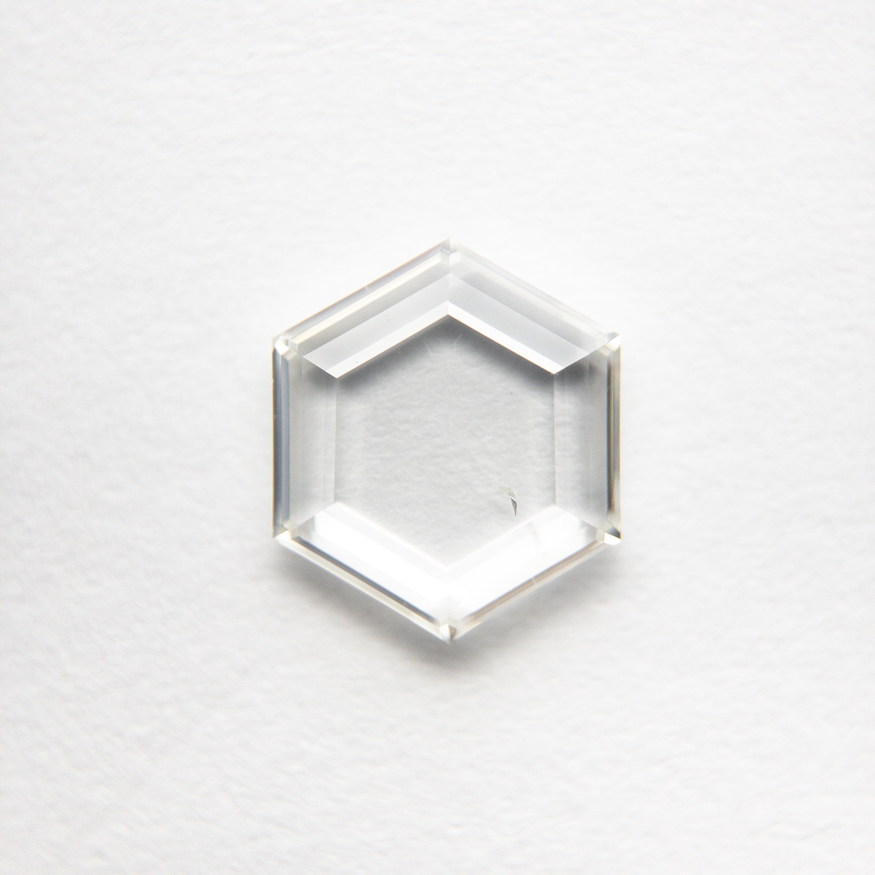 The 1.03ct 8.01x7.00x1.78mm SI1 J-K Hexagon Portrait Cut 18878-04 by East London jeweller Rachel Boston | Discover our collections of unique and timeless engagement rings, wedding rings, and modern fine jewellery.