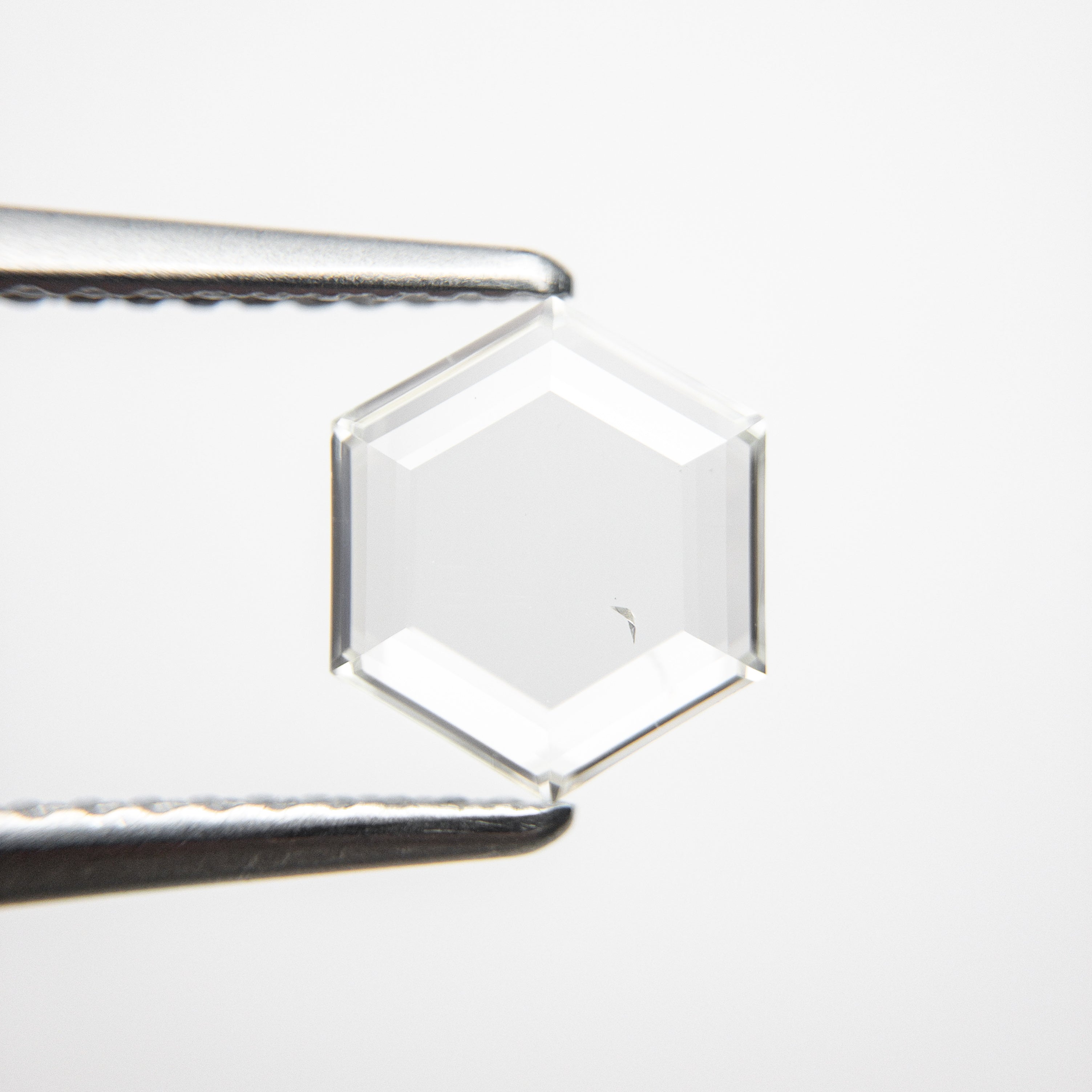 The 1.03ct 8.01x7.00x1.78mm SI1 J-K Hexagon Portrait Cut 18878-04 by East London jeweller Rachel Boston | Discover our collections of unique and timeless engagement rings, wedding rings, and modern fine jewellery.